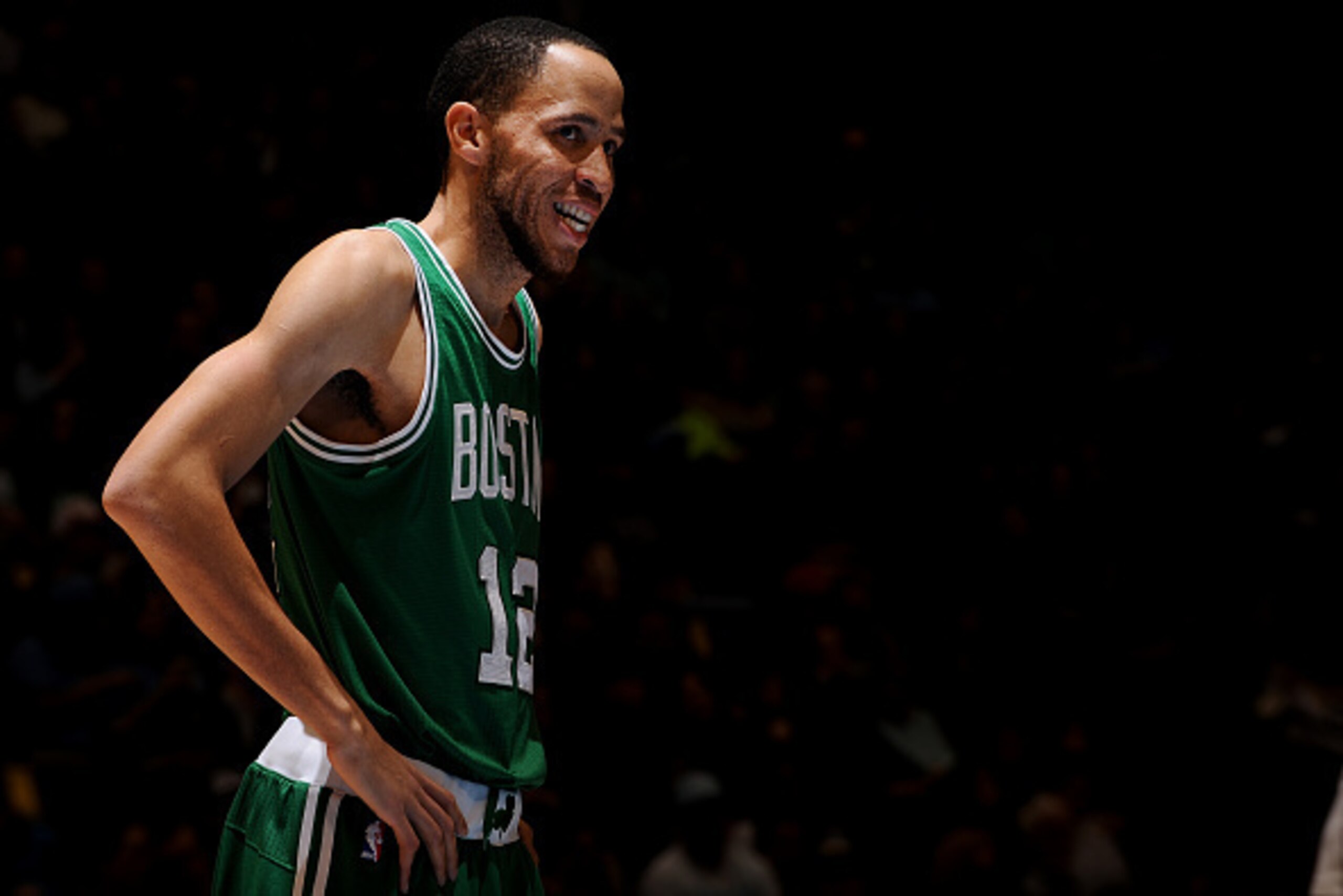 DENVER, CO - JANUARY 23:  Tayshaun Prince #12 of the Boston Celtics smiles during the game against the Denver Nuggets on January 23, 2015 at the Pepsi Center in Denver, Colorado. NOTE TO USER: User expressly acknowledges and agrees that, by downloading an