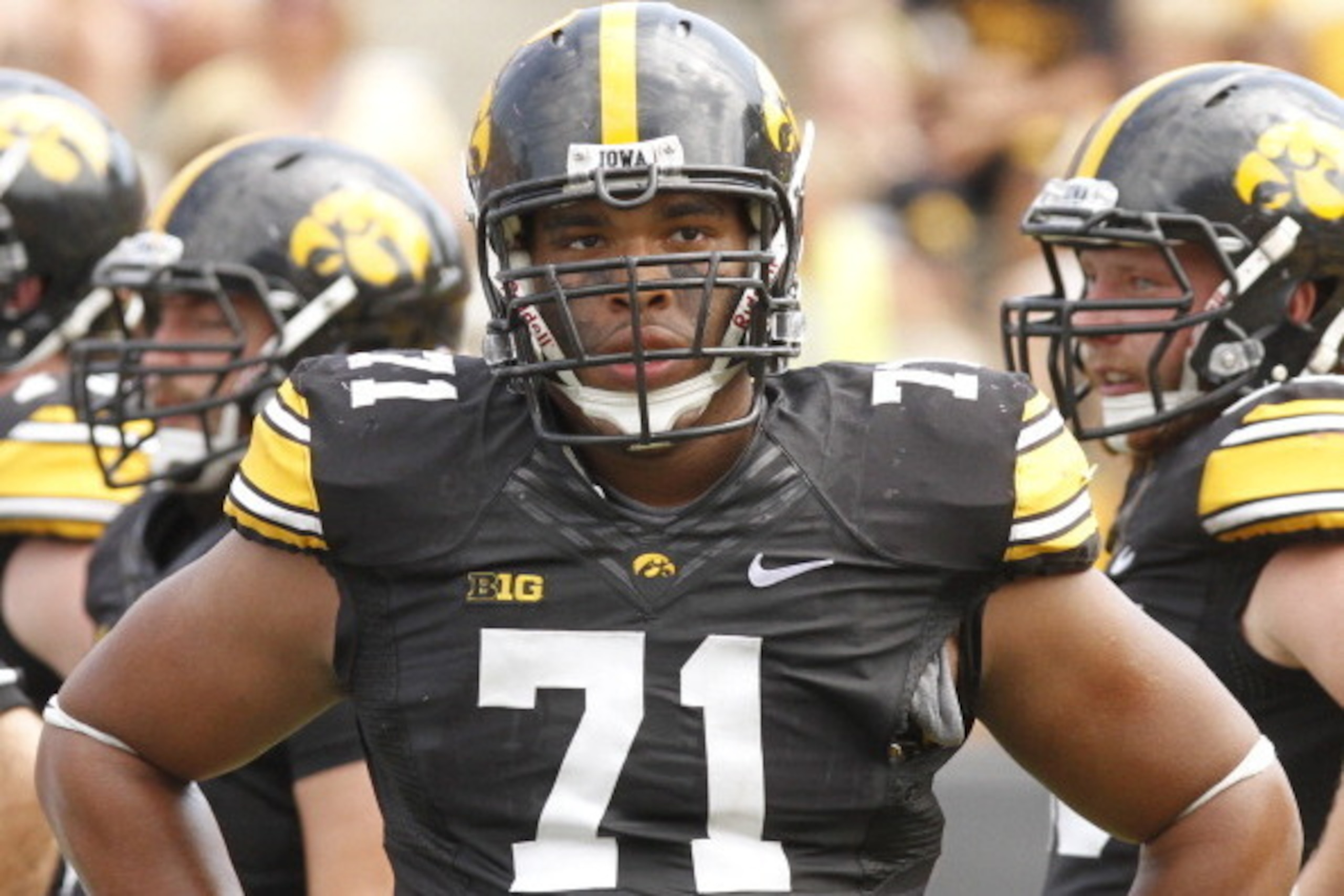 IOWA CITY, IOWA- SEPTEMBER 7:  Defensive lineman Carl Davis #71 of the Iowa Hawkeyes during a break in the action in the fourth quarter against the Missouri State Bears on September 7, 2013 at Kinnick Stadium in Iowa City, Iowa. Iowa won 28-14. (Photo by 