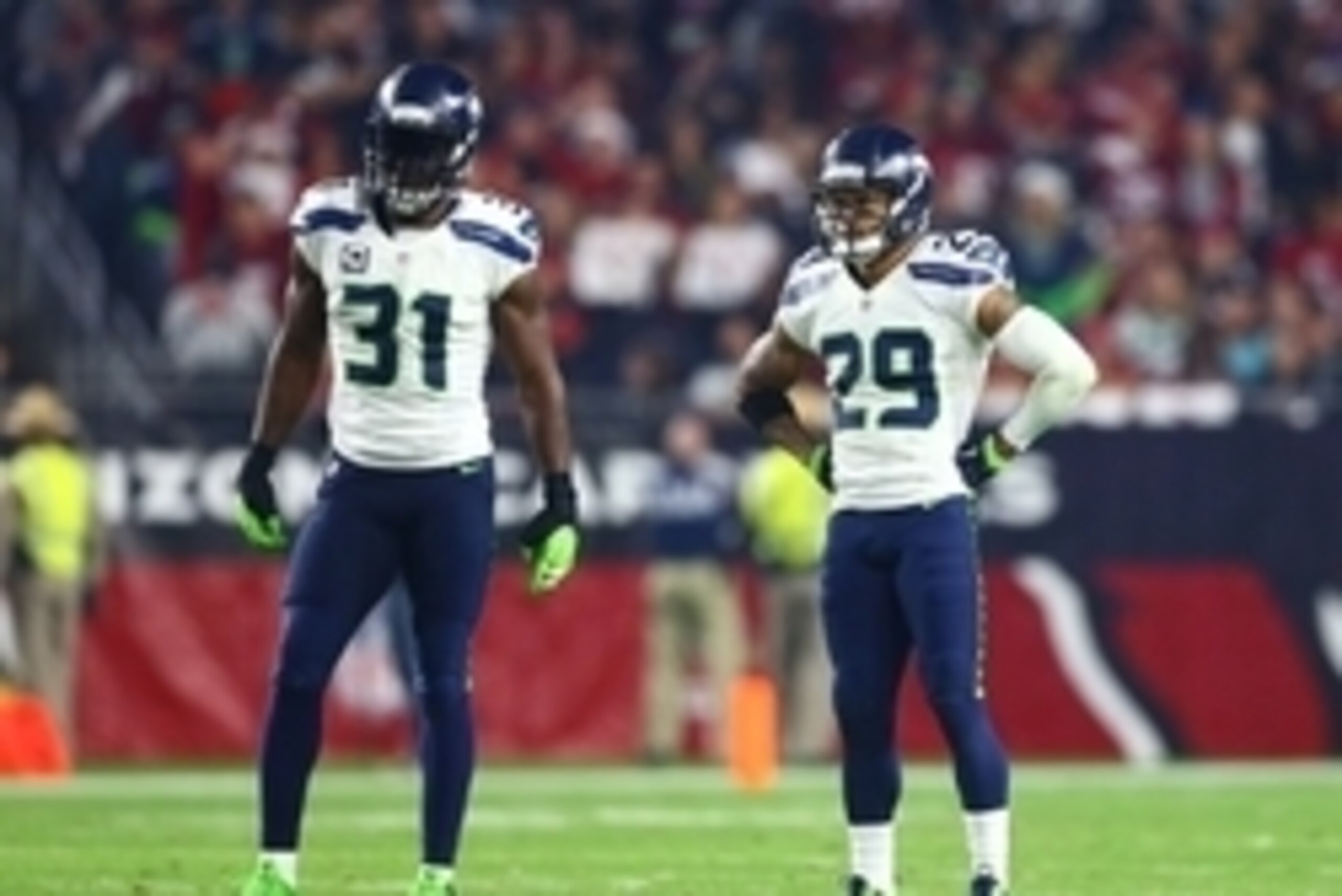 Dec 21, 2014; Glendale, AZ, USA; Seattle Seahawks safety Kam Chancellor (31) and safety Earl Thomas (29) against the Arizona Cardinals at University of Phoenix Stadium. The Seahawks defeated the Cardinals 35-6. Mandatory Credit: Mark J. Rebilas-USA TODAY 