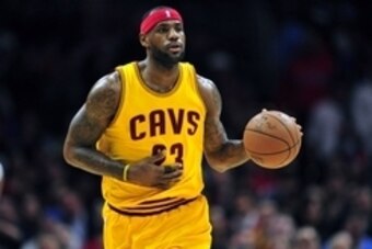January 16, 2015; Los Angeles, CA, USA; Cleveland Cavaliers forward LeBron James (23) moves the ball up court against the Los Angeles Clippers during the first half at Staples Center. Mandatory Credit: Gary A. Vasquez-USA TODAY Sports