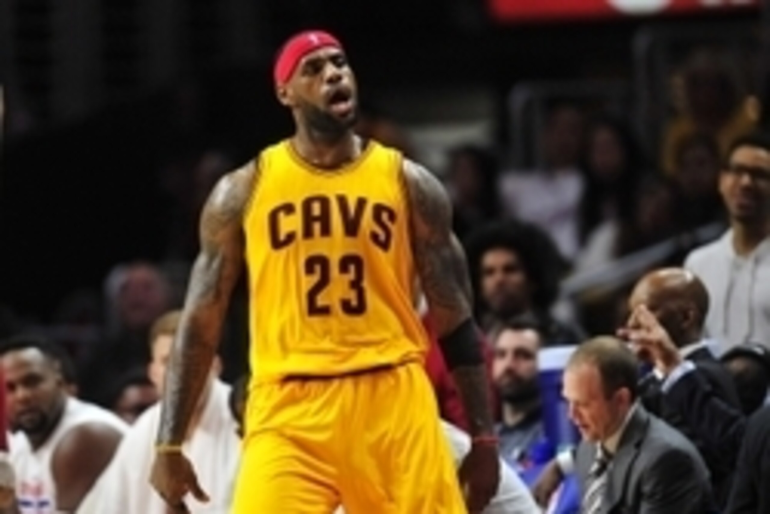 January 16, 2015; Los Angeles, CA, USA; Cleveland Cavaliers forward LeBron James (23) reacts after he shoots a basket against the Los Angeles Clippers during the second half at Staples Center. Mandatory Credit: Gary A. Vasquez-USA TODAY Sports