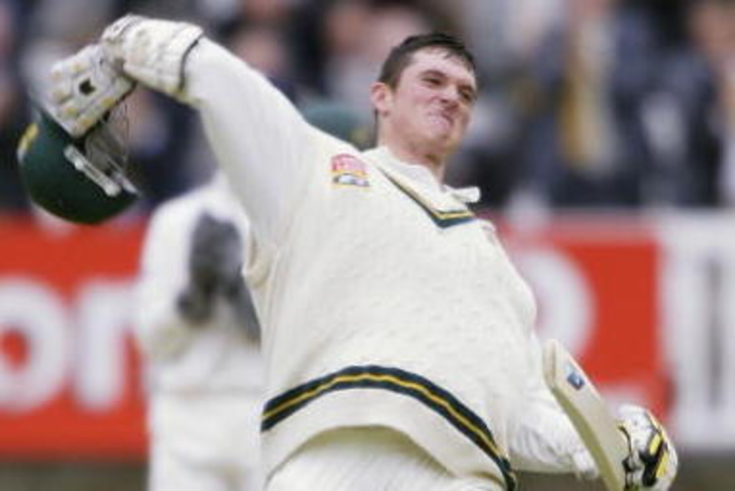 LONDON - AUGUST 1:  Graeme Smith of South Africa celebrates scoring a double century during the second day of the second npower test match between England and South Africa on August 1, 2003 at Lords Cricket Ground in London. (Photo By Paul Gilham/Getty Im