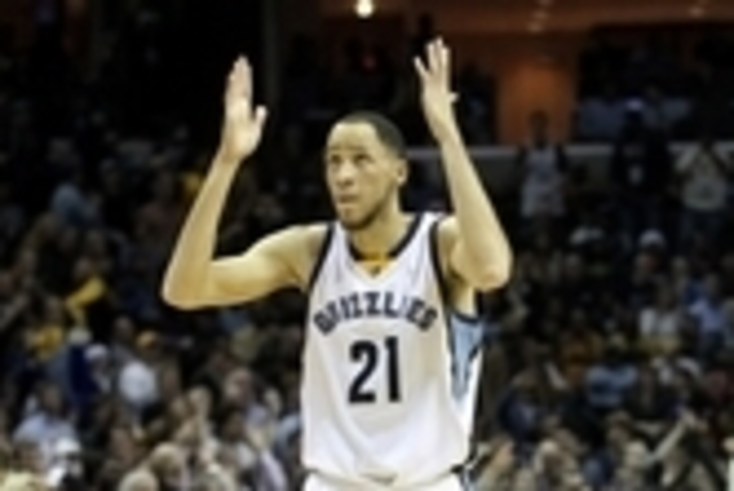 Dec 16, 2014; Memphis, TN, USA; Memphis Grizzlies forward Tayshaun Prince (21) reacts after scoring agains the Golden State Warriors at FedExForum. Grizzlies defeated the Warriors 105-98. Mandatory Credit: Nelson Chenault-USA TODAY Sports