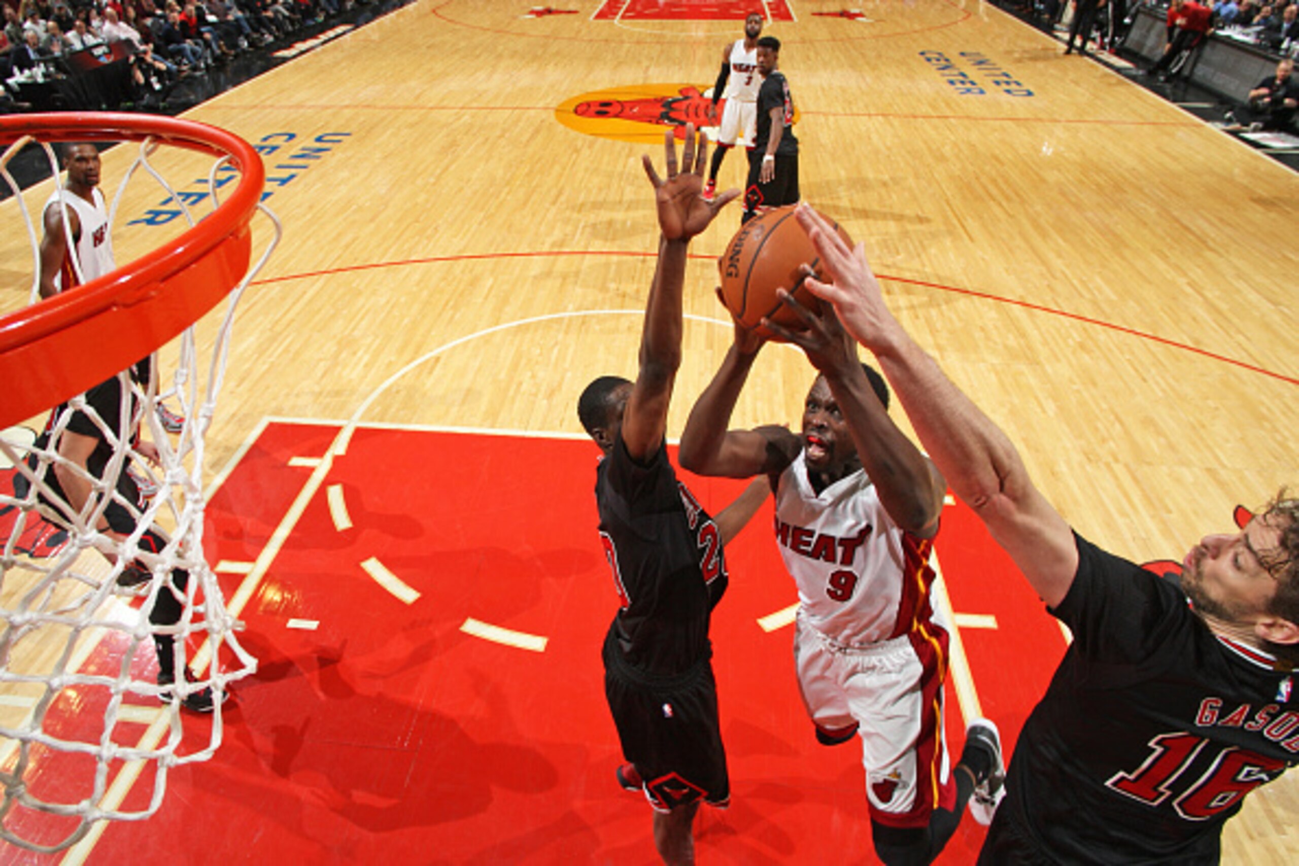 CHICAGO, IL - JANUARY 25:  Luol Deng #9 of the Miami Heat shoots the ball against the Chicago Bulls during the game on January 25, 2015 at the United Center in Chicago, Illinois. NOTE TO USER: User expressly acknowledges and agrees that, by downloading an