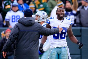 GREEN BAY, WI - JANUARY 11:  Dez Bryant #88 of the Dallas Cowboys waits for a replay on a call late in the fourth quarter against the Green Bay Packers during the 2015 NFC Divisional Playoff game at Lambeau Field on January 11, 2015 in Green Bay, Wisconsi