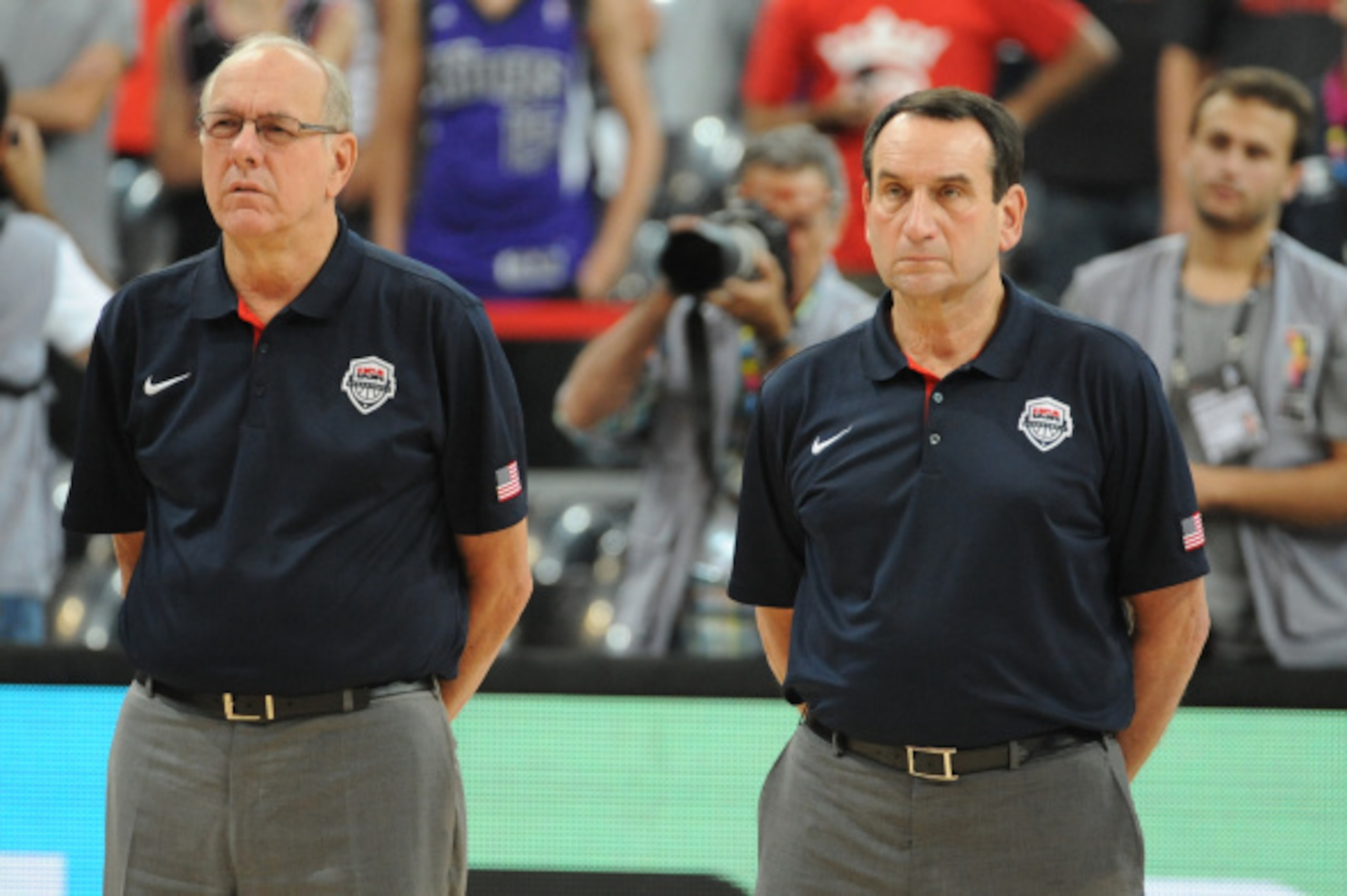 BARCELONA, SPAIN - SEPTEMBER 6: Coaches Jim Boeheim and Mike Krzyzewski of the USA Basketball Men's National Team stands for the National Anthem against the Mexico National Team during the 2014 FIBA World Cup at Palau Sant Jordi on September 6, 2014 in Ba