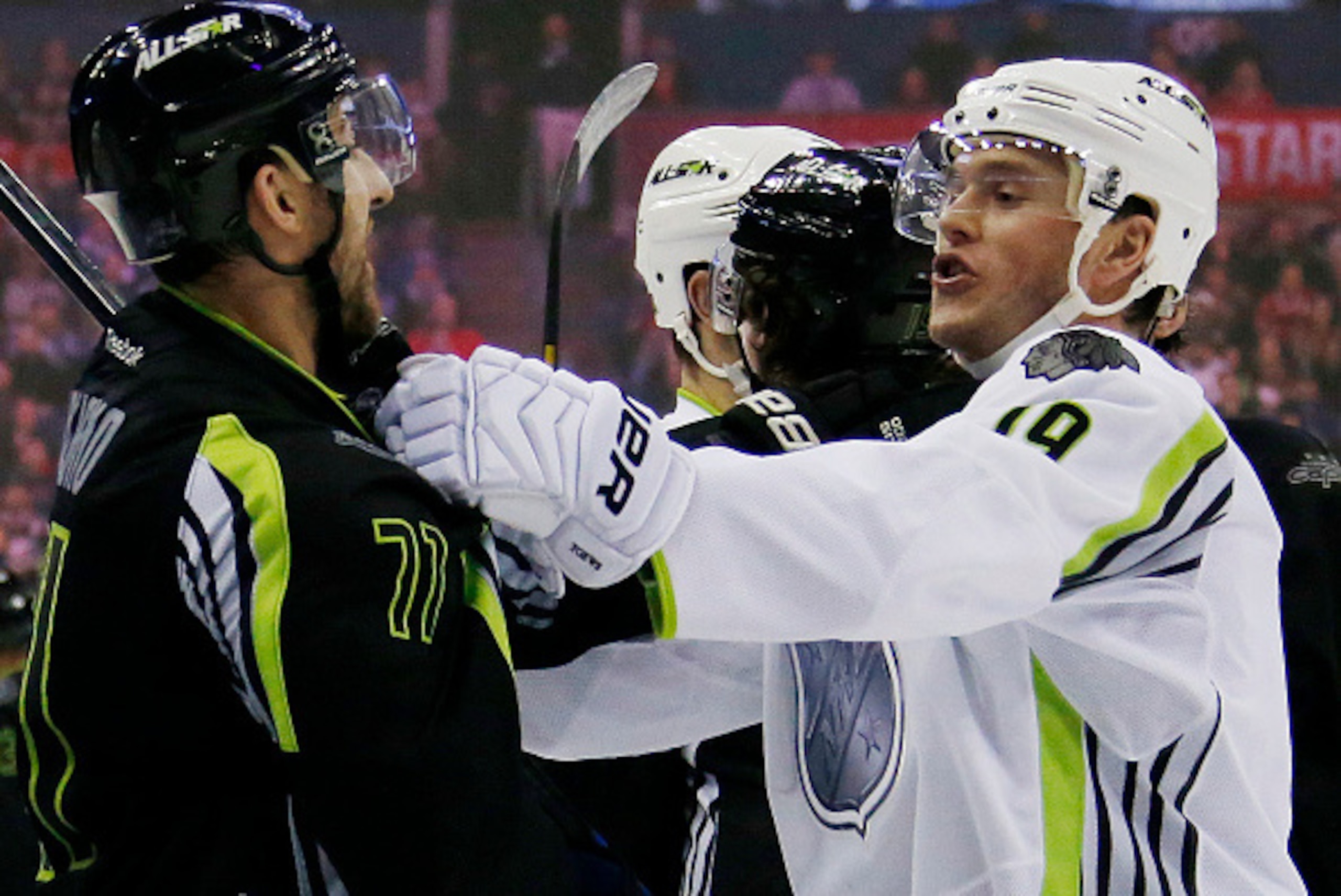 COLUMBUS, OH - JANUARY 25:  Jonathan Toews #19 of the Chicago Blackhawks and Team Toews fake fights with Nick Foligno #71 of the Columbus Blue Jackets and Team Foligno during the 2015 Honda NHL All-Star Game at Nationwide Arena on January 25, 2015 in Colu