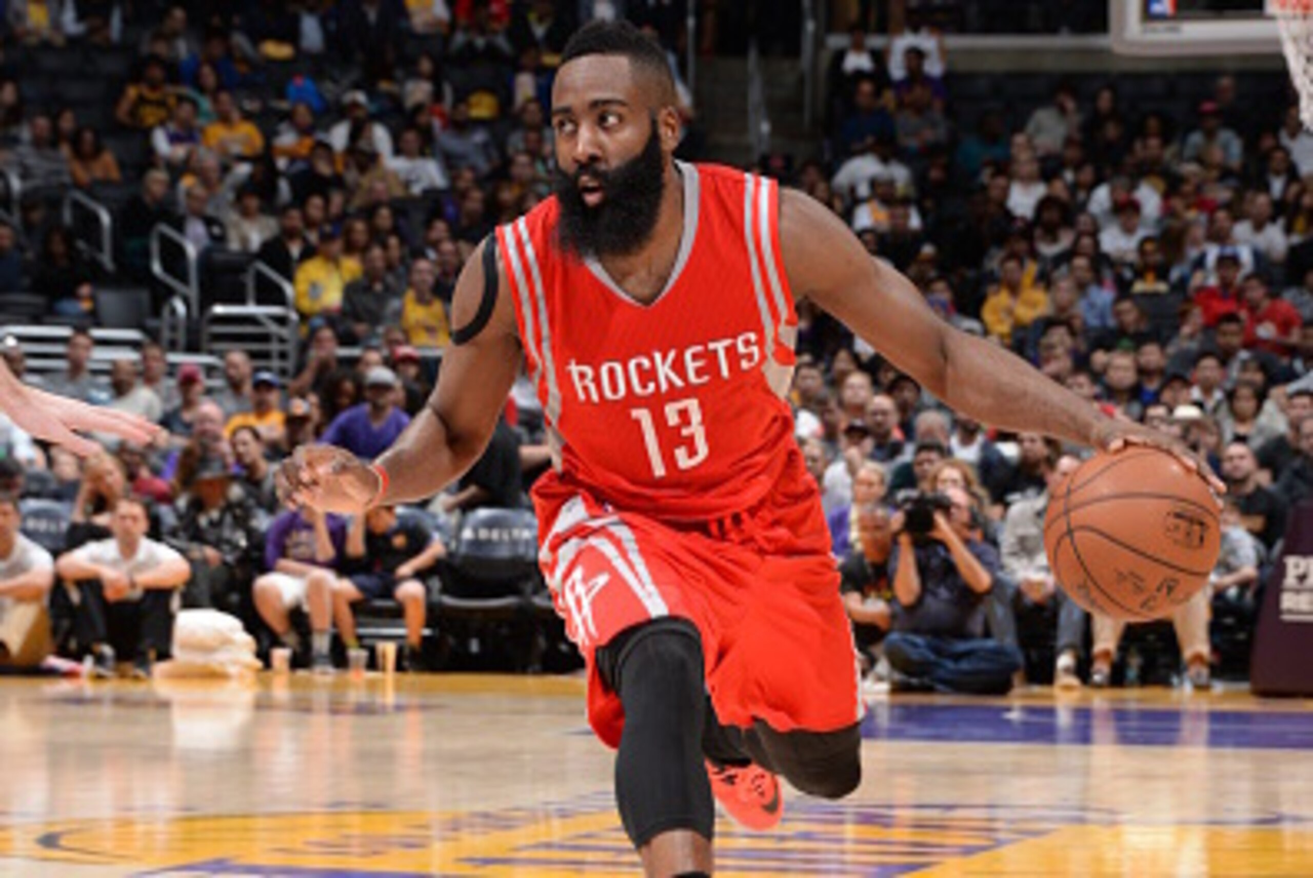 LOS ANGELES, CA - JANUARY 25:  James Harden #13 of the Houston Rockets drives to the basket against the Los Angeles Lakers on January 25, 2015 at Staples Center in Los Angeles, California. NOTE TO USER: User expressly acknowledges and agrees that, by down