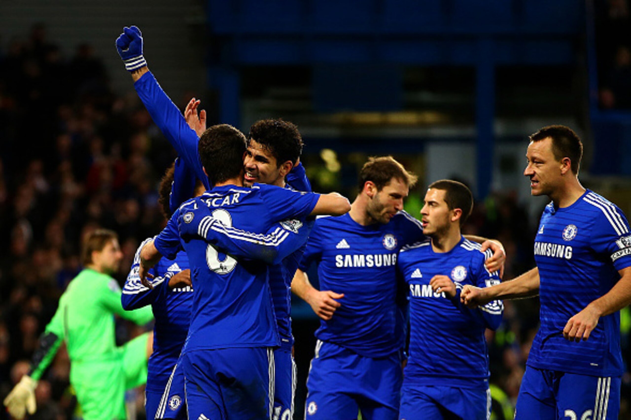 LONDON, ENGLAND - JANUARY 10:  Diego Costa of Chelsea celebrates with team-mates after scoring his team's second goal during the Barclays Premier League match between Chelsea and Newcastle United at Stamford Bridge on January 10, 2015 in London, England. 
