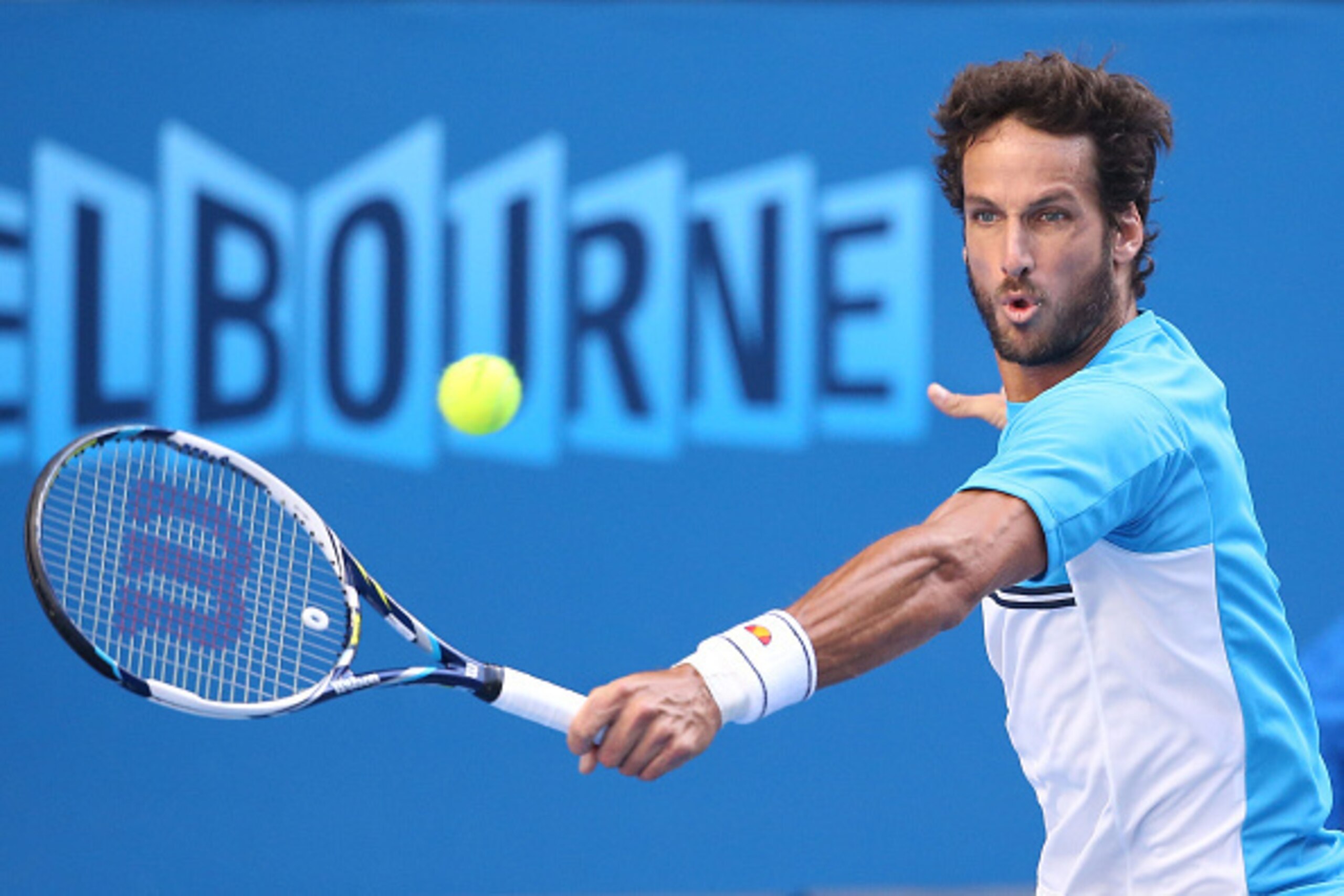 MELBOURNE, AUSTRALIA - JANUARY 26:  Feliciano Lopez of Spain plays a backhand in his fourth round match against Milos Raonic of Canada during day eight of the 2015 Australian Open at Melbourne Park on January 26, 2015 in Melbourne, Australia.  (Photo by M