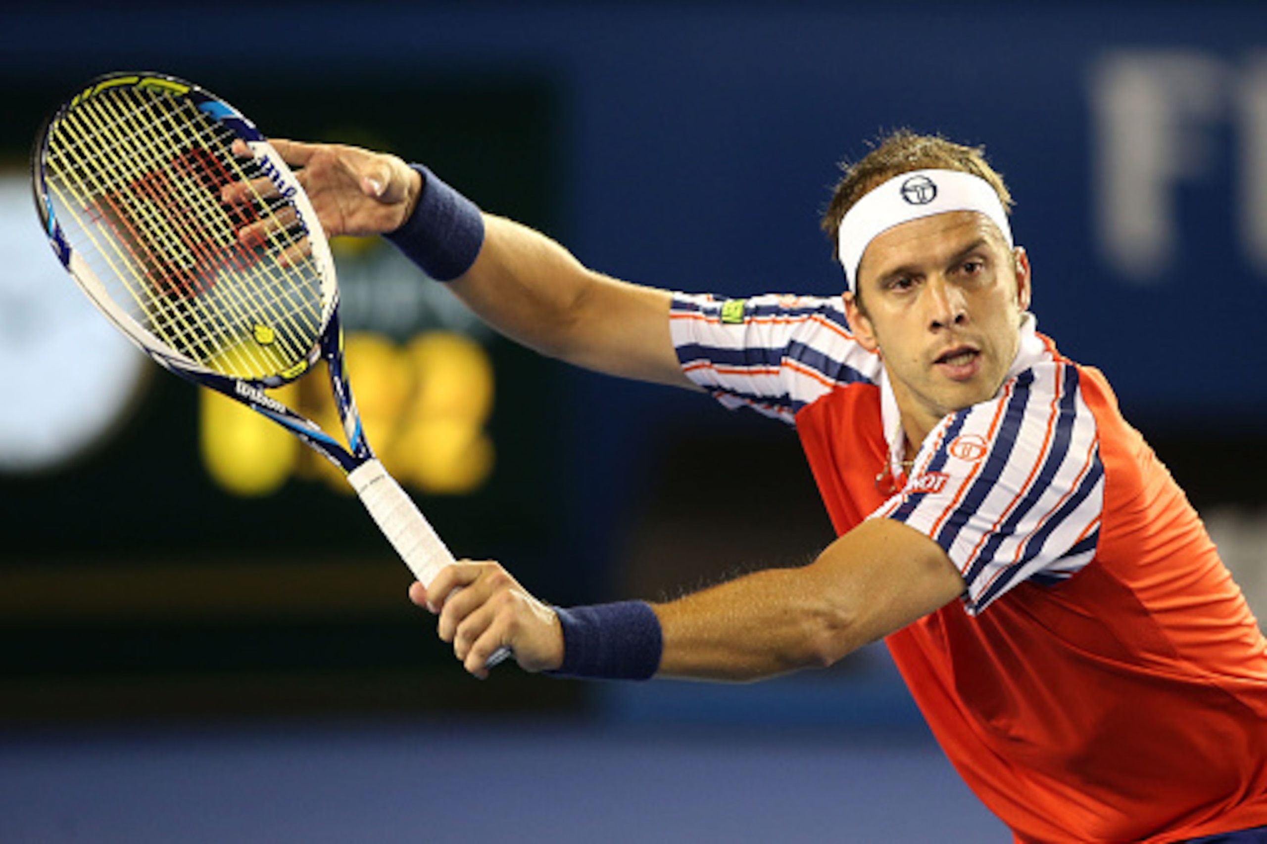 MELBOURNE, AUSTRALIA - JANUARY 26:   Gilles Muller of Luxembourg during his match against Novak Djokovic of Serbia on Rod Laver Arena during day eight of the 2015 Australian Open at Melbourne Park on January 26, 2015 in Melbourne, Australia.  (Photo by Pa