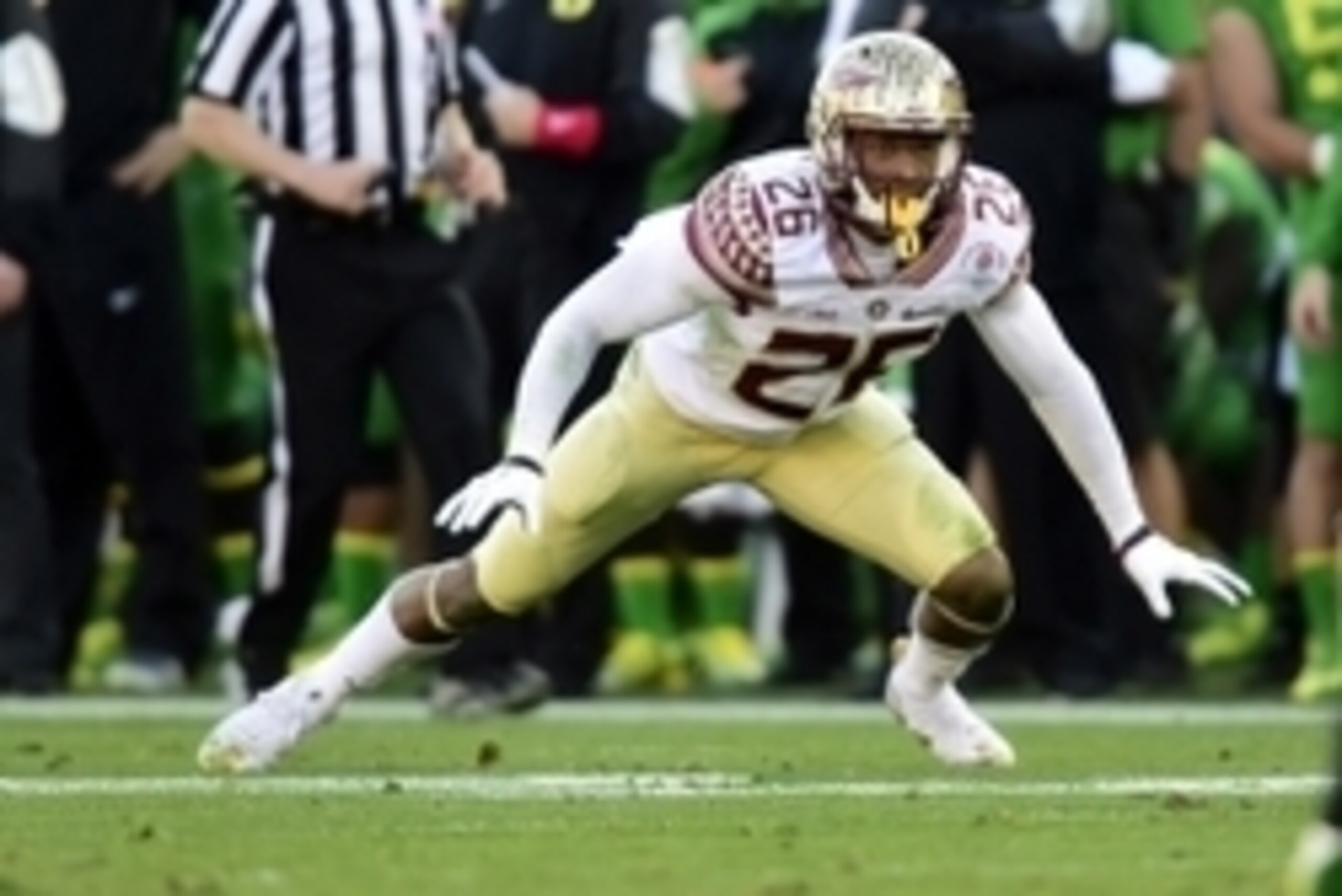 January 1, 2015; Pasadena, CA, USA; Florida State Seminoles defensive back P.J. Williams (26) in defense position against the Oregon Ducks in the 2015 Rose Bowl college football game at Rose Bowl. Mandatory Credit: Gary A. Vasquez-USA TODAY Sports