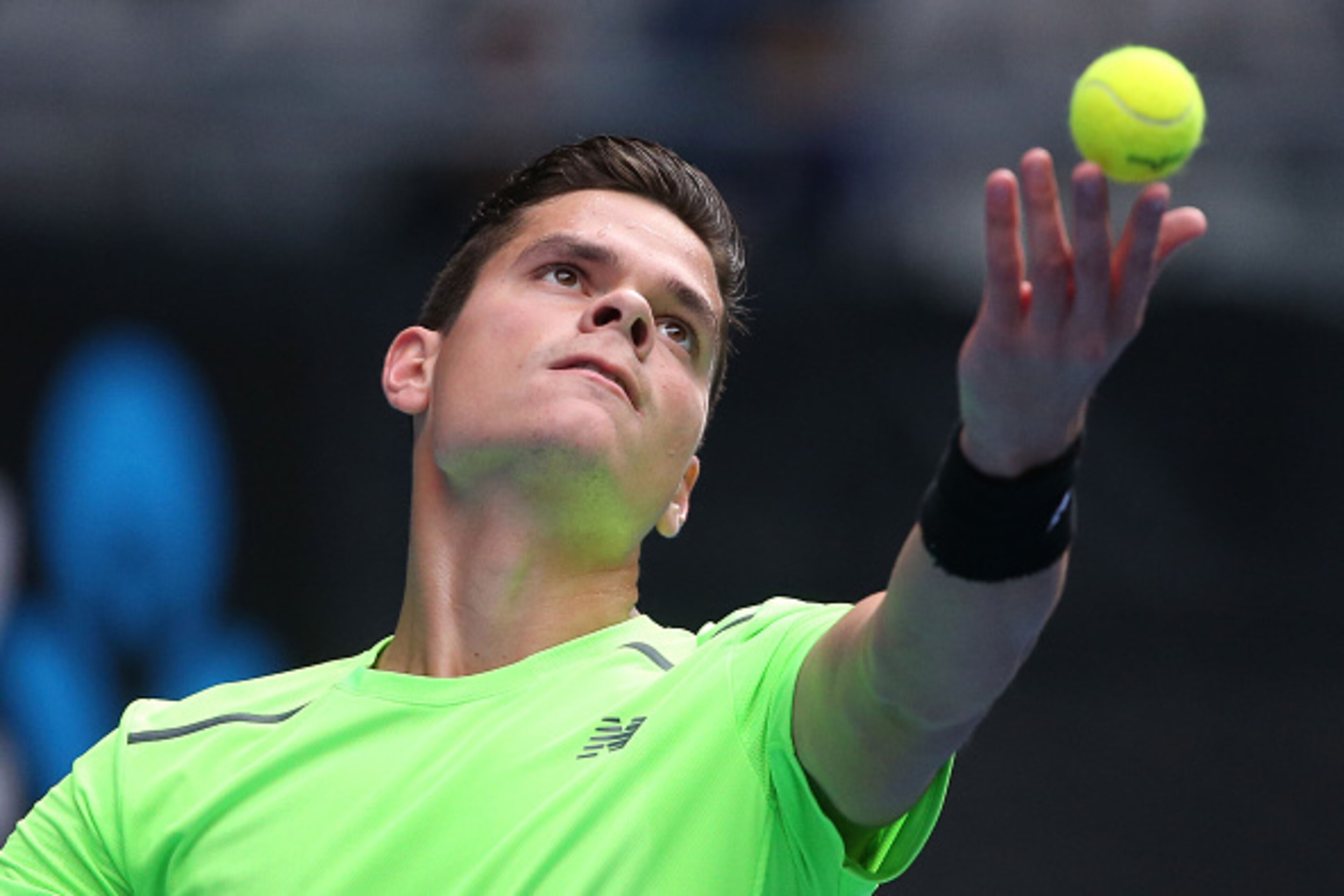 MELBOURNE, AUSTRALIA - JANUARY 26:  Milos Raonic of Canada serves in his fourth round match against Feliciano Lopez of Spain during day eight of the 2015 Australian Open at Melbourne Park on January 26, 2015 in Melbourne, Australia.  (Photo by Michael Dod
