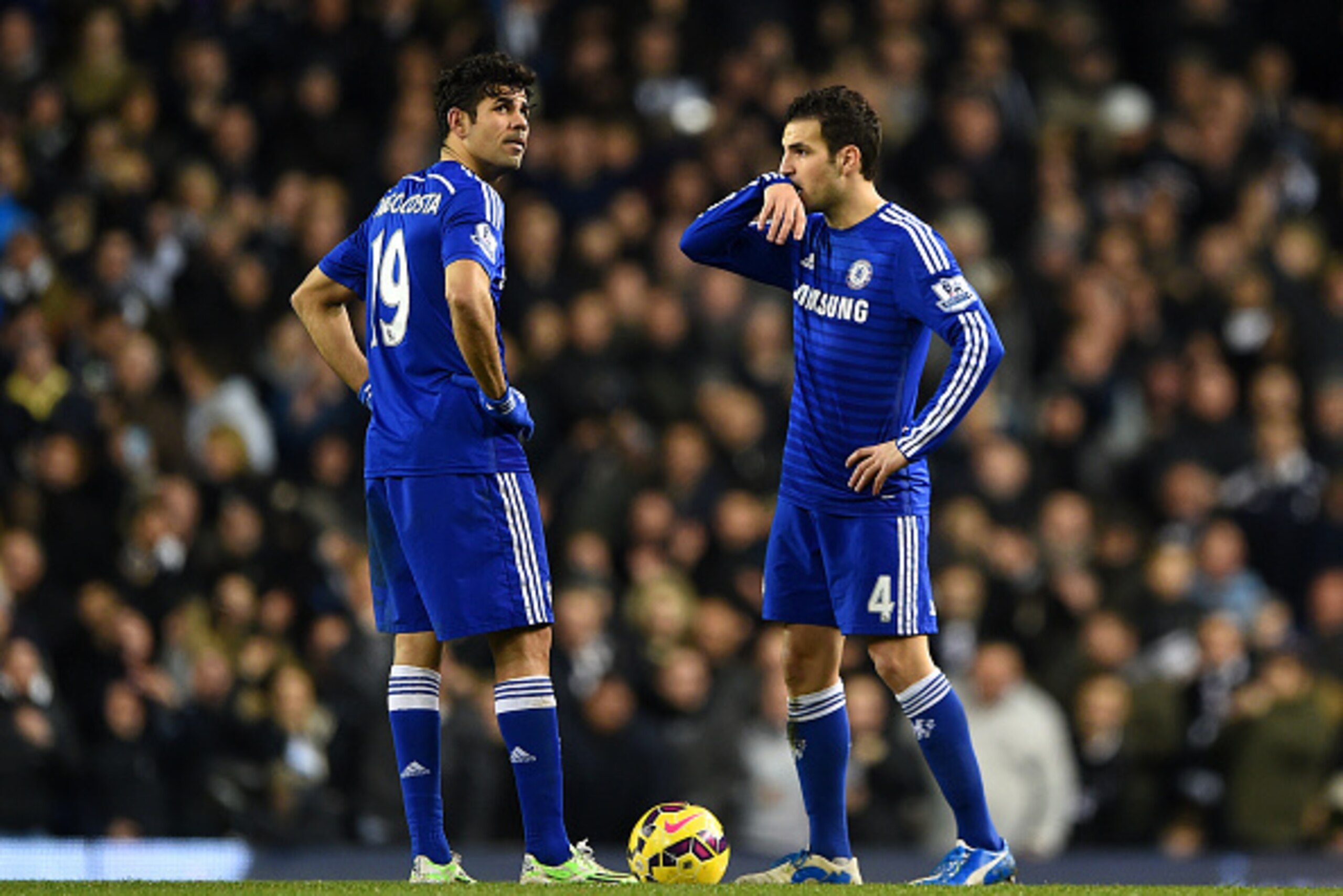LONDON, ENGLAND - JANUARY 01:  Cesc Fabregas and Diego Costa of Chelsea show their dejection after conceding a fourth goal during the Barclays Premier League match between Tottenham Hotspur and Chelsea at White Hart Lane on January 1, 2015 in London, Engl