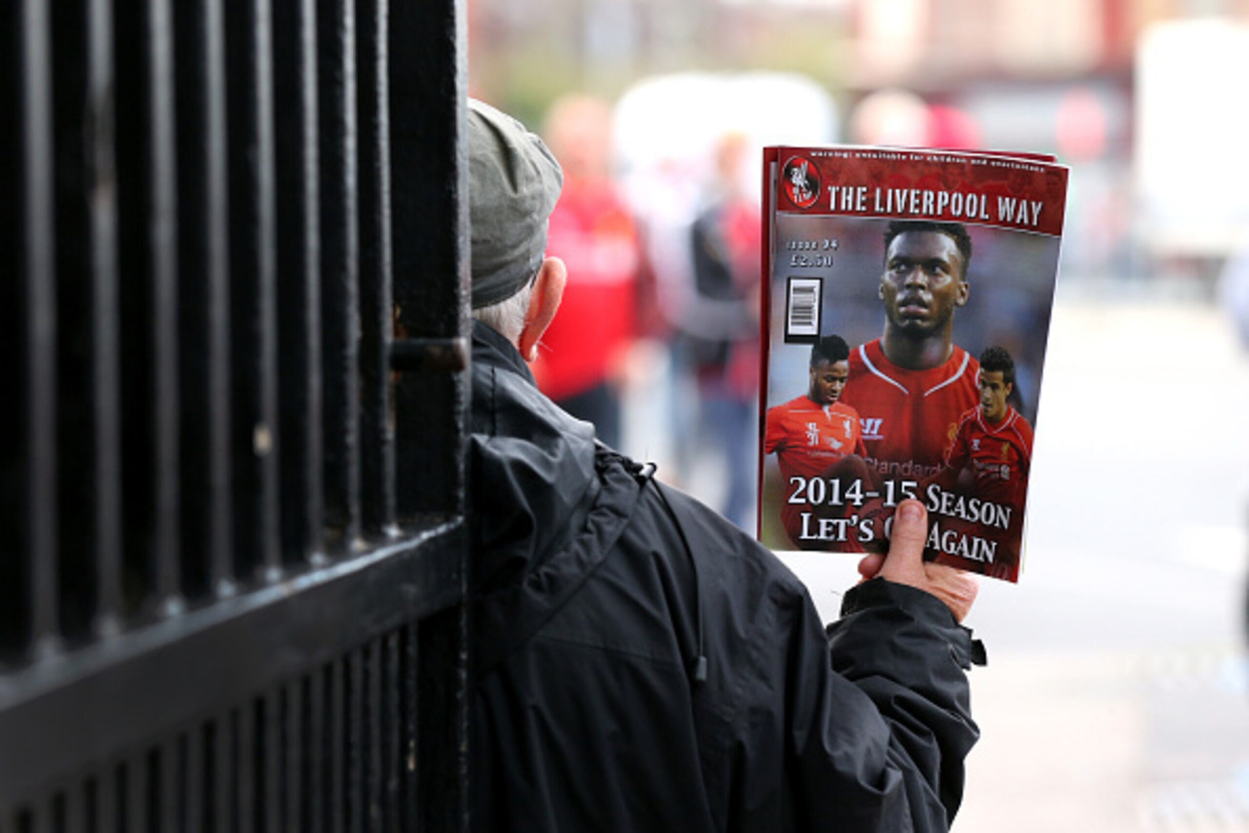 LIVERPOOL, ENGLAND - SEPTEMBER 27:  Daniel Sturridge of Liverpool is seen on the front of a fanzine prior to the Barclays Premier League match between Liverpool and Everton at Anfield on September 27, 2014 in Liverpool, England.  (Photo by Alex Livesey/Ge