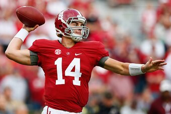 TUSCALOOSA, AL - OCTOBER 18:  Jake Coker #14 of the Alabama Crimson Tide looks to pass against the Texas A&M Aggies at Bryant-Denny Stadium on October 18, 2014 in Tuscaloosa, Alabama.  (Photo by Kevin C. Cox/Getty Images)