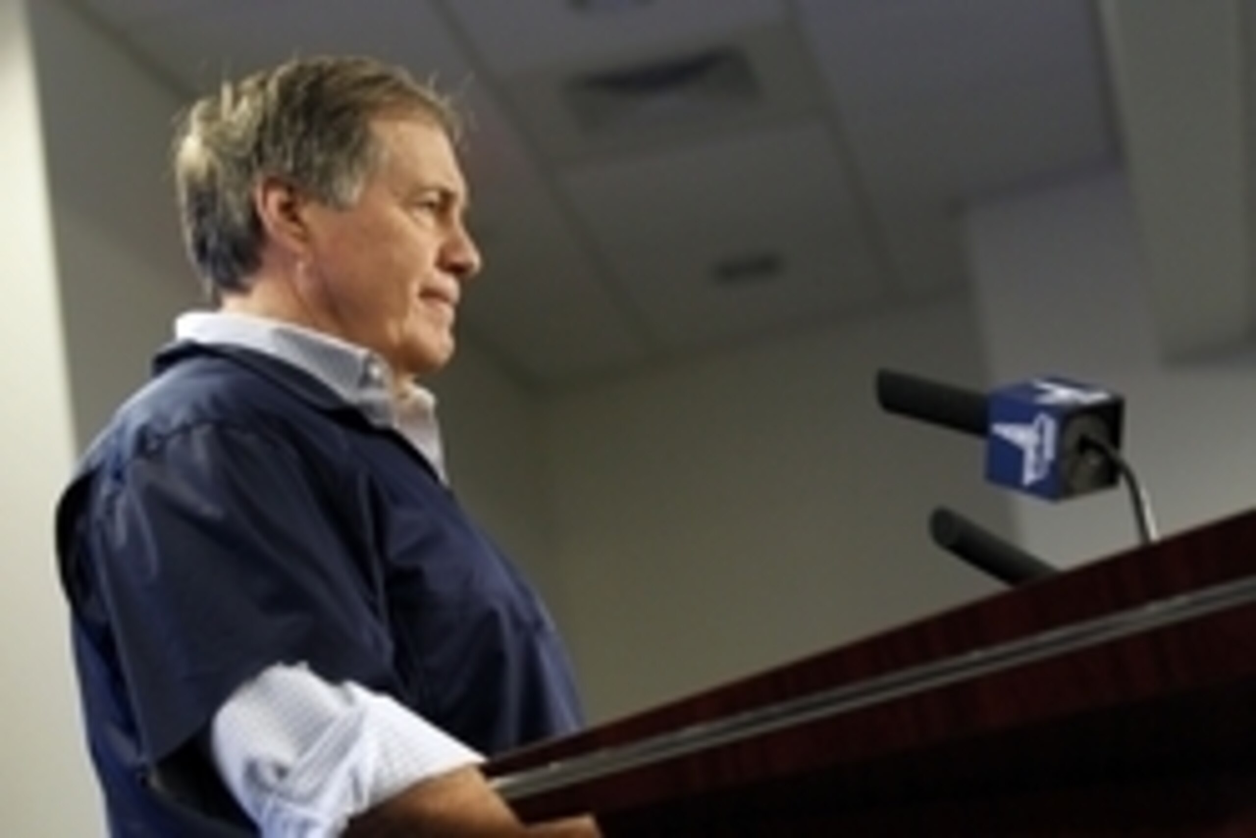 Jan 22, 2015; Foxborough, MA, USA; New England Patriots head coach Bill Belichick makes a statement regarding deflated footballs in the AFC Championship game during a press conference at Gillette Stadium. Mandatory Credit: Stew Milne-USA TODAY Sports