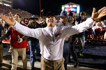OXFORD, MS - NOVEMBER 29:  Head coach Hugh Freeze of the Mississippi Rebels celebrates after defeating the Mississippi State Bulldogs 31-17 at Vaught-Hemingway Stadium on November 29, 2014 in Oxford, Mississippi.  (Photo by Streeter Lecka/Getty Images)