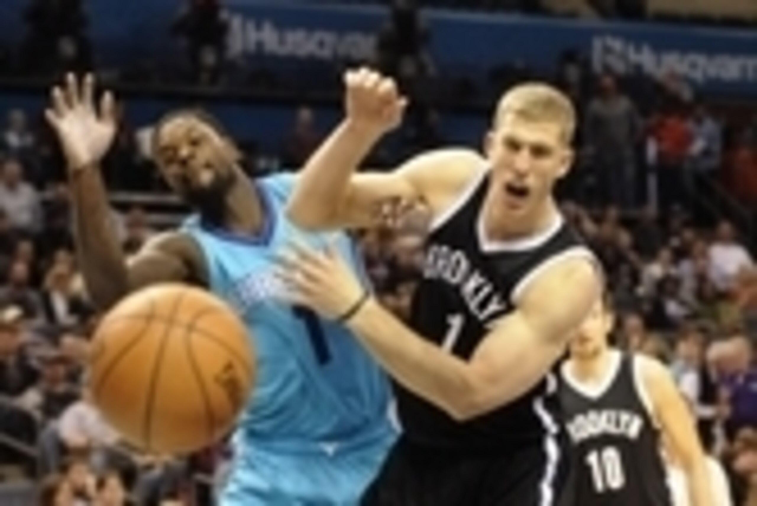 Dec 13, 2014; Charlotte, NC, USA; Charlotte Hornets guard Lance Stephenson (1) and Brooklyn Nets center forward Mason Plumlee (1) fight for a rebound during the first half of the game at Time Warner Cable Arena. Mandatory Credit: Sam Sharpe-USA TODAY Spor