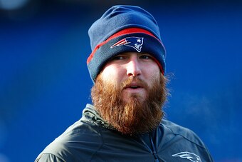 FOXBORO, MA - JANUARY 10:  Bryan Stork #66 of the New England Patriots warms up before the 2014 AFC Divisional Playoffs game against the Baltimore Ravens at Gillette Stadium on January 10, 2015 in Foxboro, Massachusetts.  (Photo by Jim Rogash/Getty Images