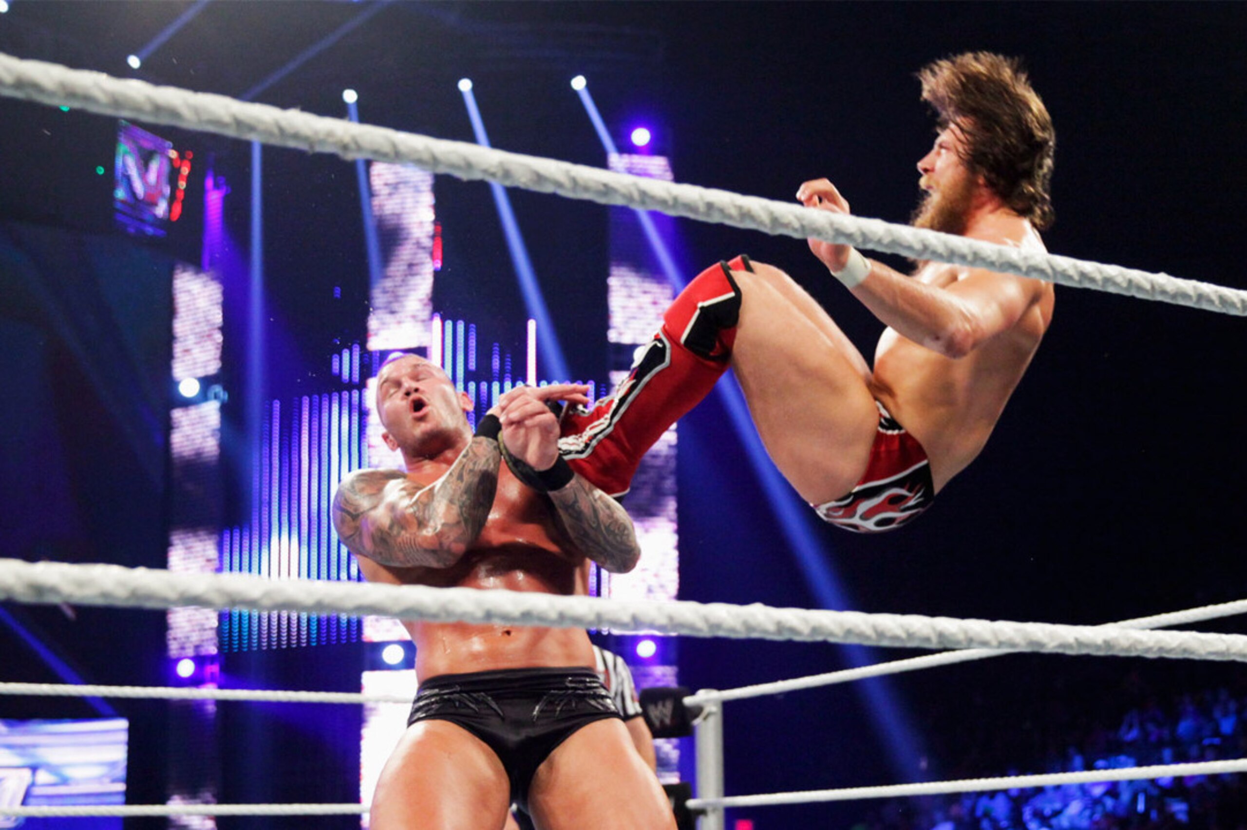 Daniel Bryan flies at Randy Orton Daniel Bryan flies at Randy Orton