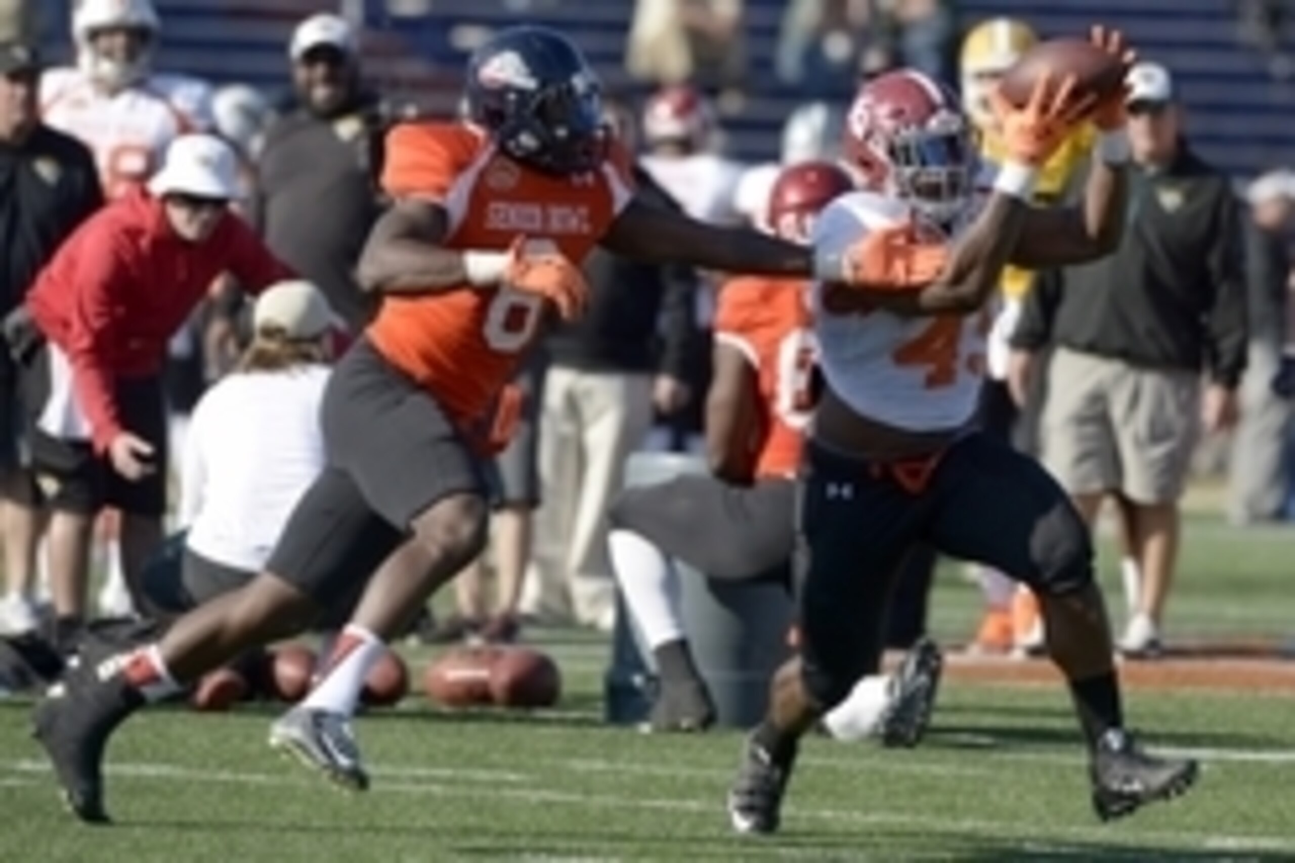 Jan 21, 2015; Mobile, AL, USA; South squad fullback Jalston Fowler of Alabama (45) catches a pass against  safety Jaquiski Tartt of Samford (6) during Senior Bowl South squad practice at Ladd-Peebles Stadium. Mandatory Credit: Glenn Andrews-USA TODAY Spor