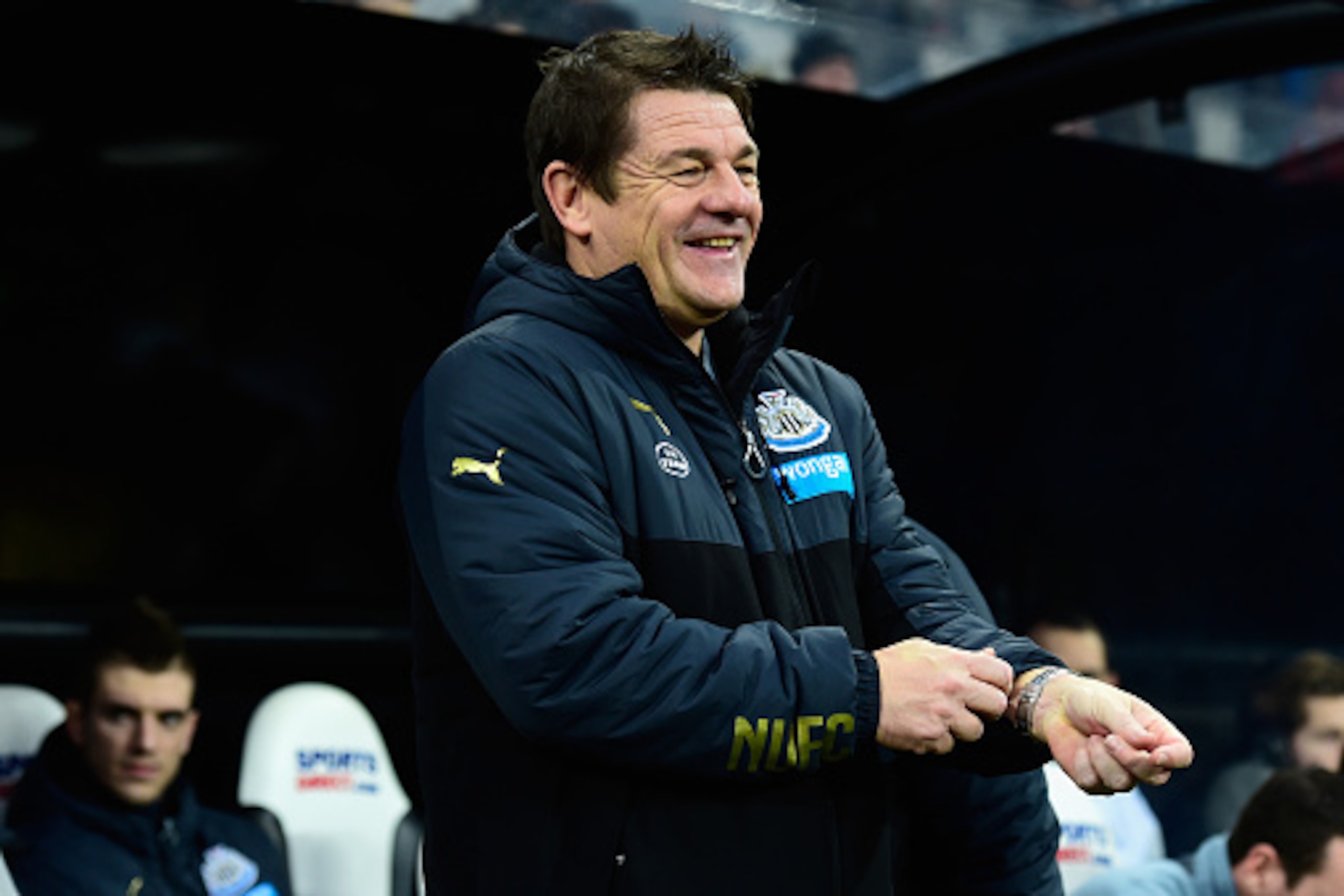 NEWCASTLE UPON TYNE, ENGLAND - JANUARY 01:  Newcastle United caretaker coach John Carver raises a smile before the Barclays Premier League match between Newcastle United and Burnley at St James' Park on January 1, 2015 in Newcastle upon Tyne, England.  (P
