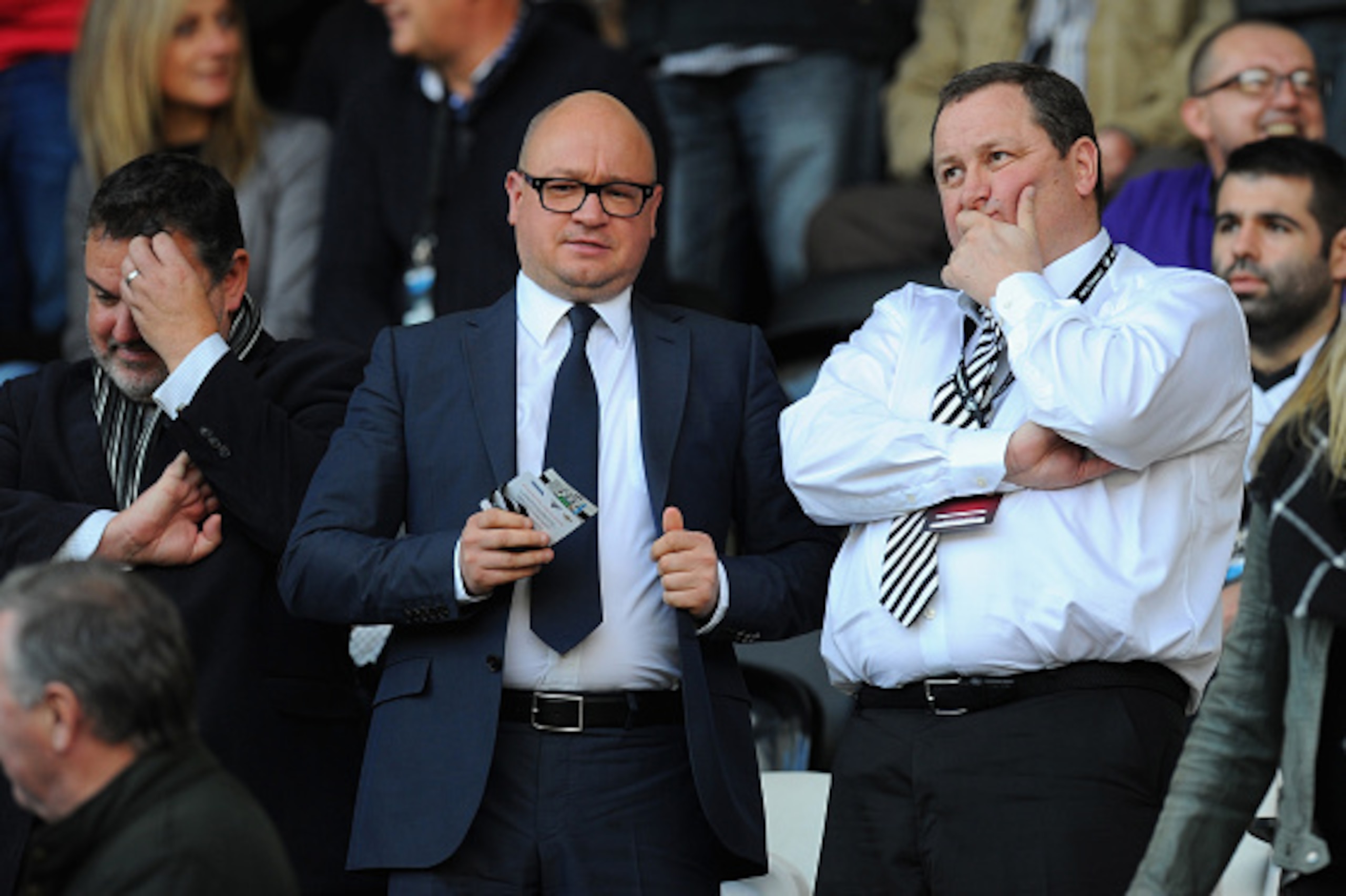 SWANSEA, WALES - OCTOBER 04:  Newcastle United owner Mike Ashley (r) chats with managing director Lee Charnley before the Barclays Premier League match between Swansea City and Newcastle United at Liberty Stadium on October 4, 2014 in Swansea, Wales.  (Ph