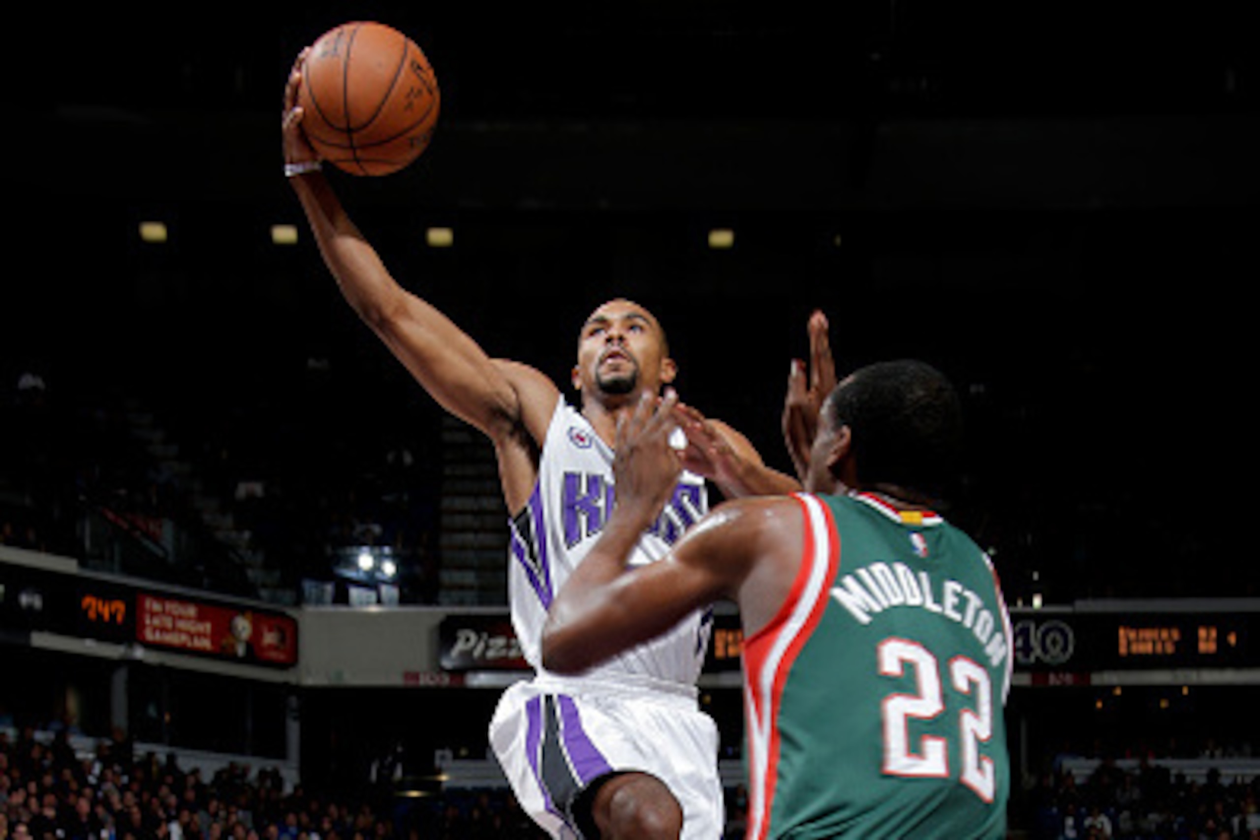 SACRAMENTO, CA - DECEMBER 18: Ramon Sessions #9 of the Sacramento Kings shoots against the Milwaukee Bucks on December 18, 2014 at Sleep Train Arena in Sacramento, California. NOTE TO USER: User expressly acknowledges and agrees that, by downloading and o