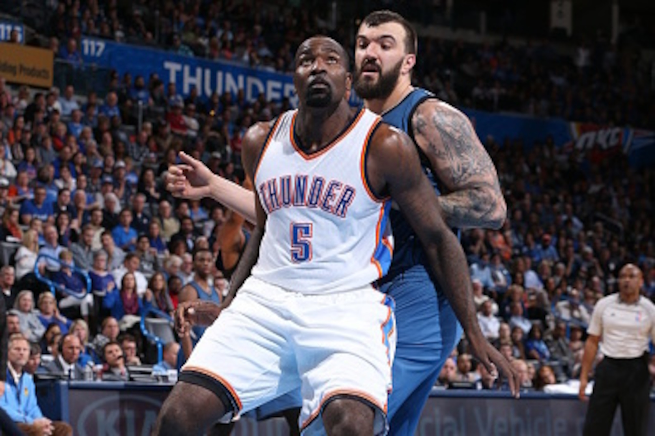 OKLAHOMA CITY, OK- JANUARY 26: Kendrick Perkins #5 of the Oklahoma City Thunder battles for position against Nikola Pekovic #14 of the Minnesota Timberwolves on January 26, 2015 at Chesapeake Energy Arena in Oklahoma City, Oklahoma. NOTE TO USER: User exp
