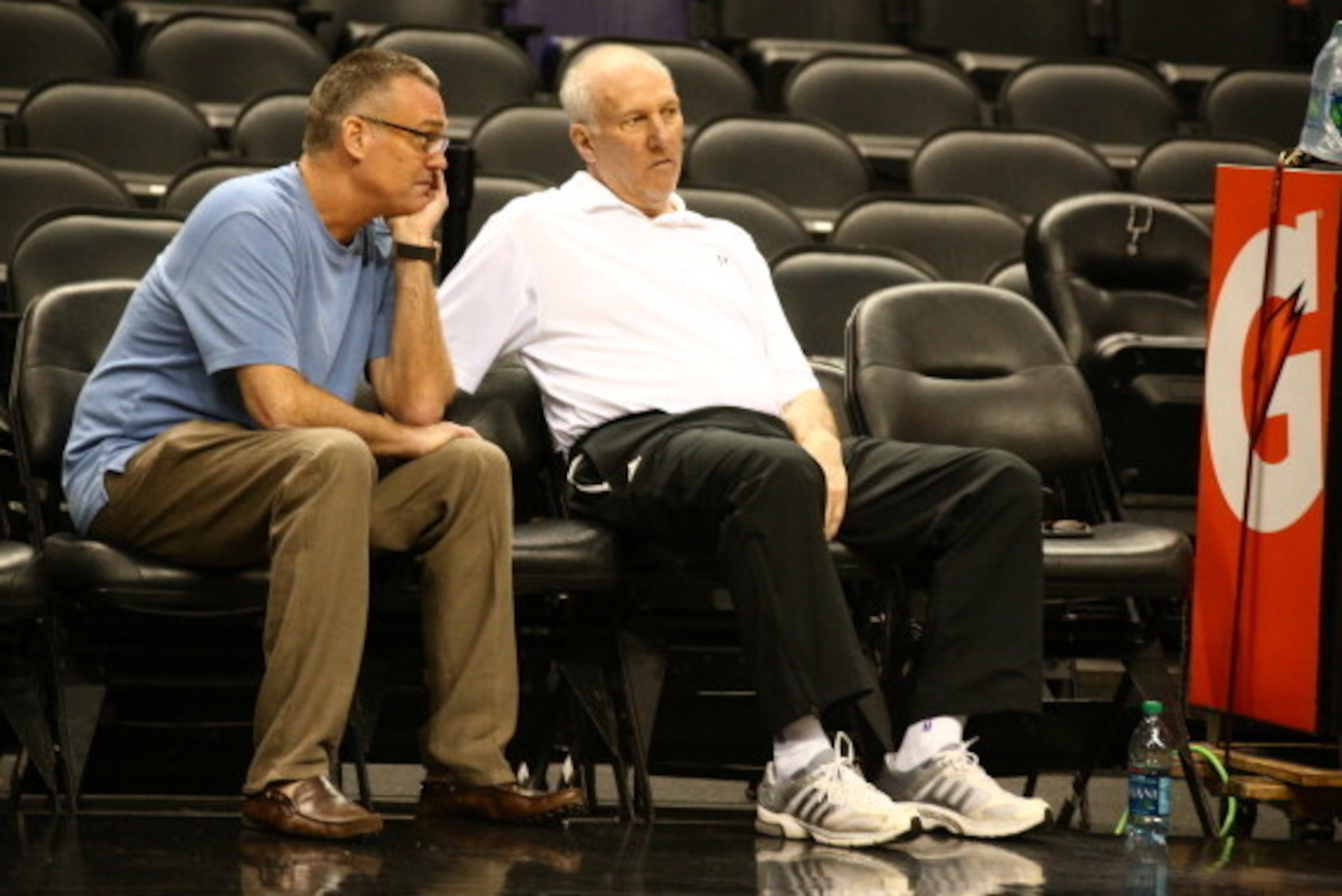 SAN ANTONIO, TX JUNE 04: General Manager, R.C.Buford and head coach Gregg Popovich of the San Antonio Spurs talk during practice as part of the 2014 NBA Finals on June 04, 2014 at AT&T Center in San Antonio, Texas. NOTE TO USER: User expressly acknowledge