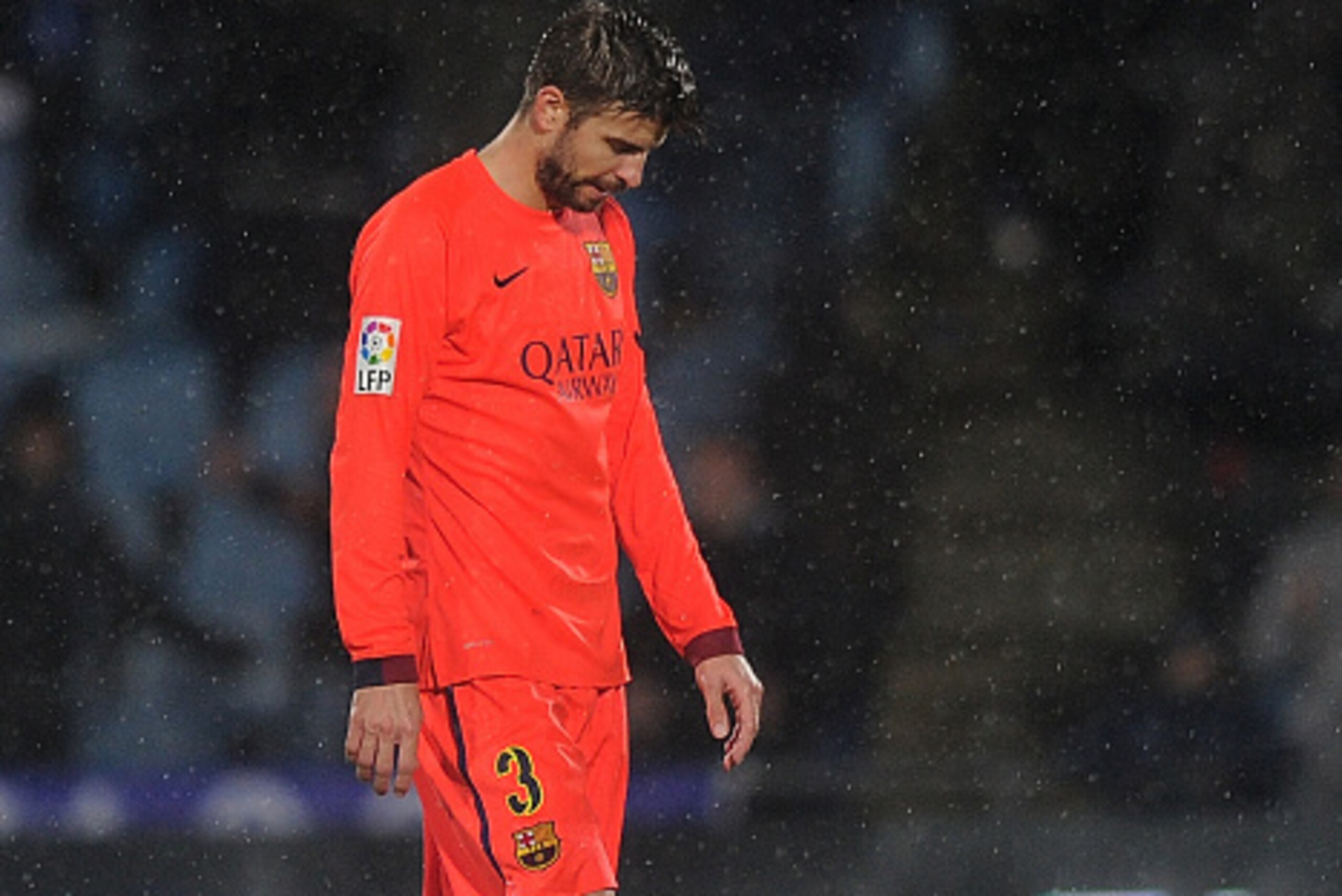 GETAFE, SPAIN - DECEMBER 13: Gerard Pique of FC Barcelona leaves the field after his side drew 0-0 against Getafe CF during the La Liga match between Getafe CF and FC Barcelona at the Alfonso Perez stadium on December 13, 2014 in Getafe, Spain.  (Photo by