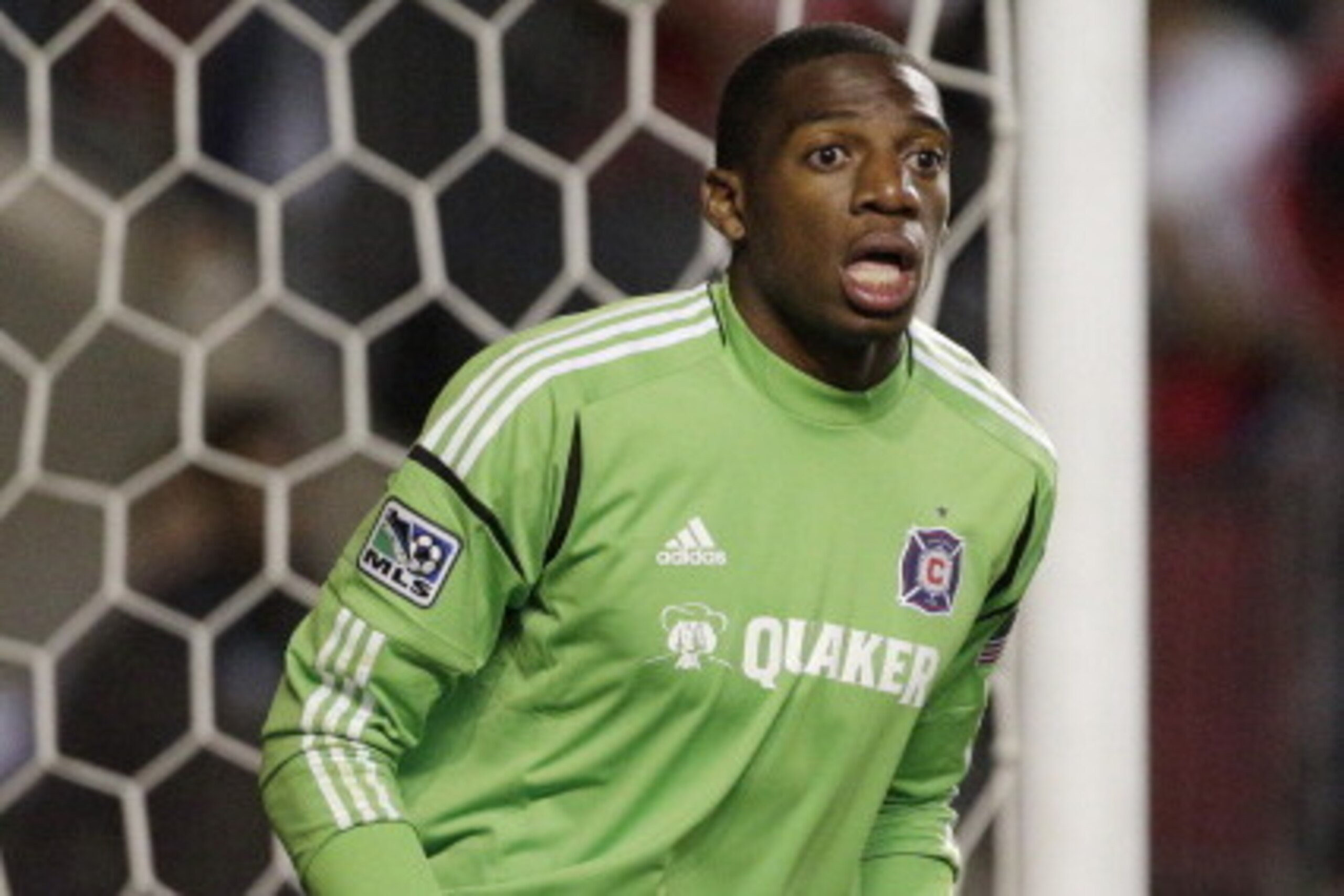 BRIDGEVIEW, IL - SEPTEMBER 22: Sean Johnson #25 of the Chicago Fire takes on the Columbus Crew during their MLS soccer match at Toyota Park on September 22, 2012 in Bridgeview, Illinois. The Fire defeated the Crew 2-1. (Photo by John Gress/Getty Images)