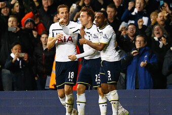 LONDON, ENGLAND - JANUARY 17:  Christian Eriksen (C) of Tottenham Hotspur celebrates scoring his team's second goal with Harry Kane (L) and Danny Rose during the Barclays Premier League match between Tottenham Hotspur and Sunderland at White Hart Lane on 