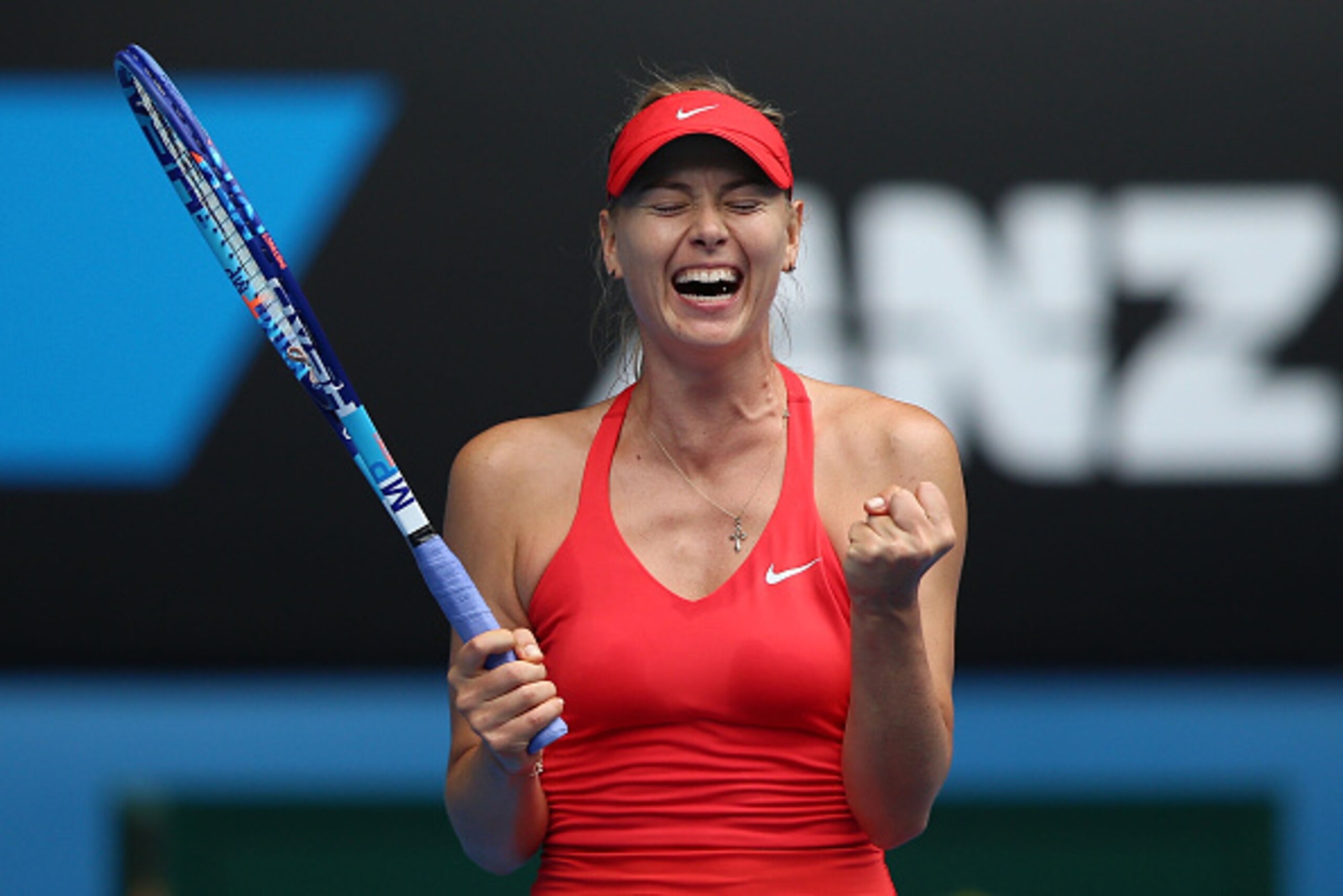 MELBOURNE, AUSTRALIA - JANUARY 27:  Maria Sharapova of Russia celebrates winning her quarterfinal match against Eugenie Bouchard of Canada during day nine of the 2015 Australian Open at Melbourne Park on January 27, 2015 in Melbourne, Australia.  (Photo b
