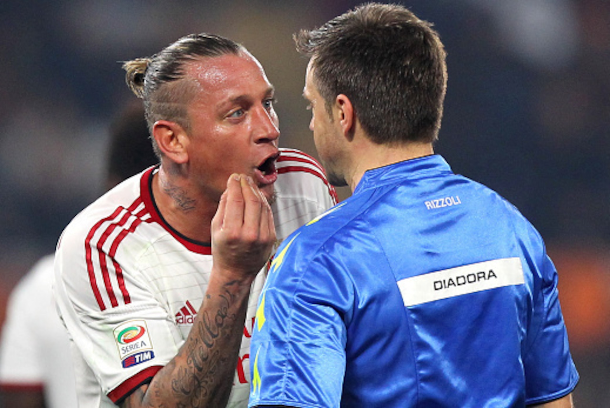 ROME, ITALY - DECEMBER 20: The referee Nicola Rizzoli reacts with Philippe Mexes (L) of AC Milan during the Serie A match betweeen AS Roma and AC Milan at Stadio Olimpico on December 20, 2014 in Rome, Italy. (Photo by Paolo Bruno/Getty Images) ROME, ITALY - DECEMBER 20: The referee Nicola Rizzoli reacts with Philippe Mexes (L) of AC Milan during the Serie A match betweeen AS Roma and AC Milan at Stadio Olimpico on December 20, 2014 in Rome, Italy. (Photo by Paolo Bruno/Getty Images)
