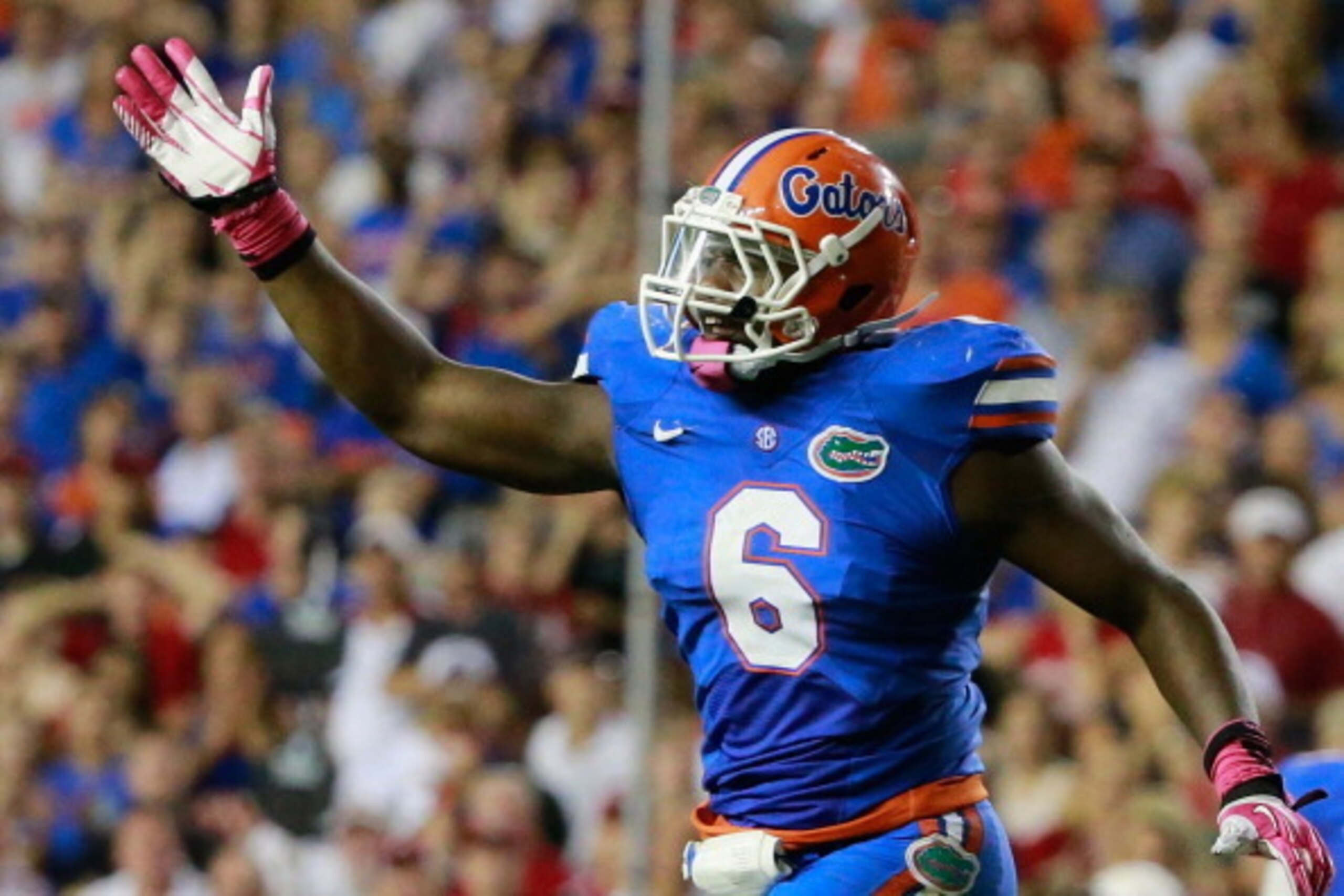 GAINESVILLE, FL - OCTOBER 05:  Dante Fowler Jr. #6 of the Florida Gators celebrates a fumble recovery during the game against the Arkansas Razorbacks at Ben Hill Griffin Stadium on October 5, 2013 in Gainesville, Florida.  (Photo by Sam Greenwood/Getty Im