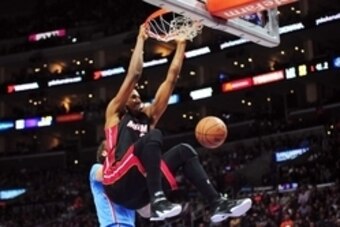 January 11, 2015; Los Angeles, CA, USA; Miami Heat center Hassan Whiteside (21) dunks to score a basket against the Los Angeles Clippers during the first half at Staples Center. Mandatory Credit: Gary A. Vasquez-USA TODAY Sports