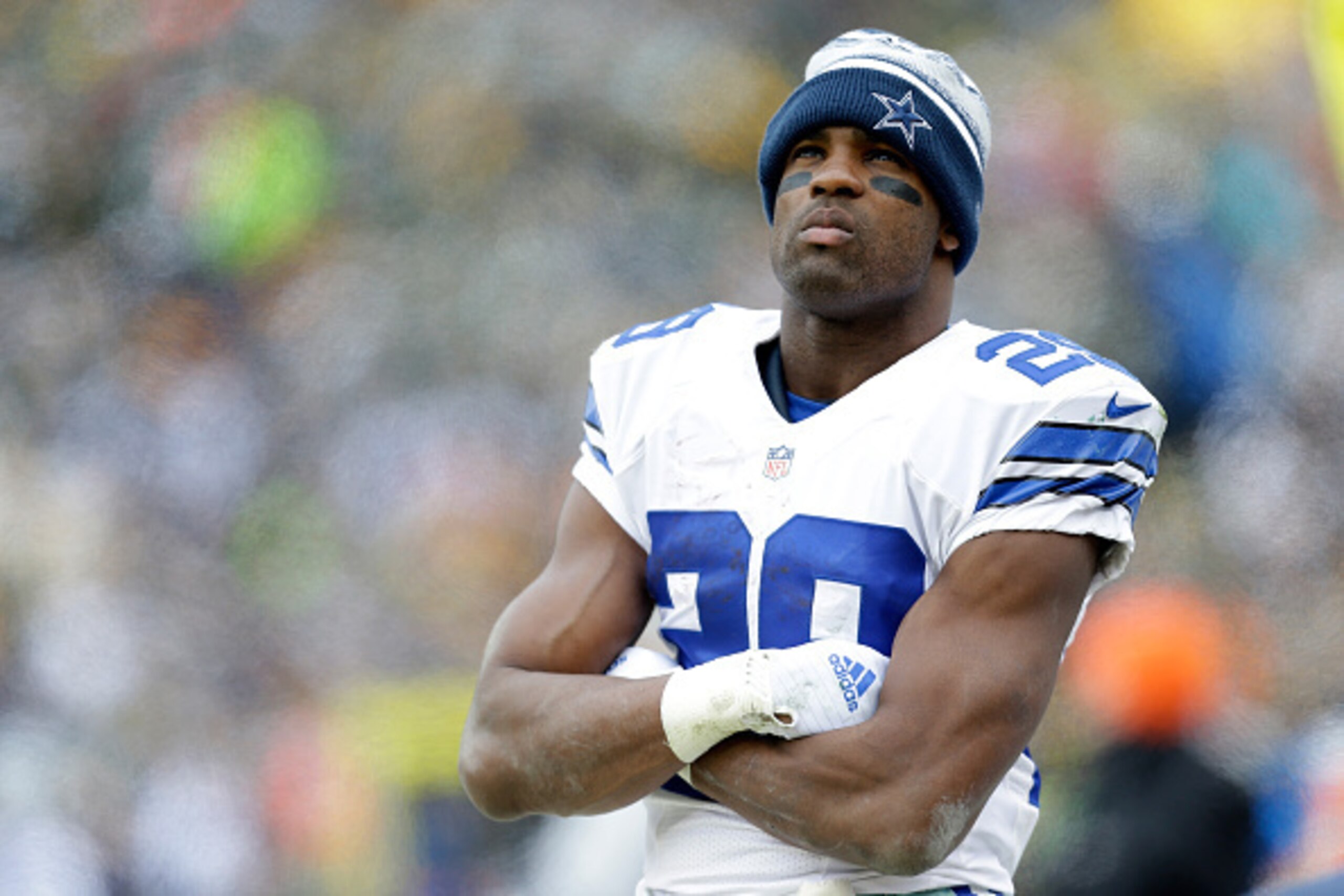 GREEN BAY, WI - JANUARY 11:   DeMarco Murray #29 of the Dallas Cowboys stands on the sideline during the game against the Green Bay Packers during the 2015 NFC Divisional Playoff game at Lambeau Field on January 11, 2015 in Green Bay, Wisconsin.  (Photo b