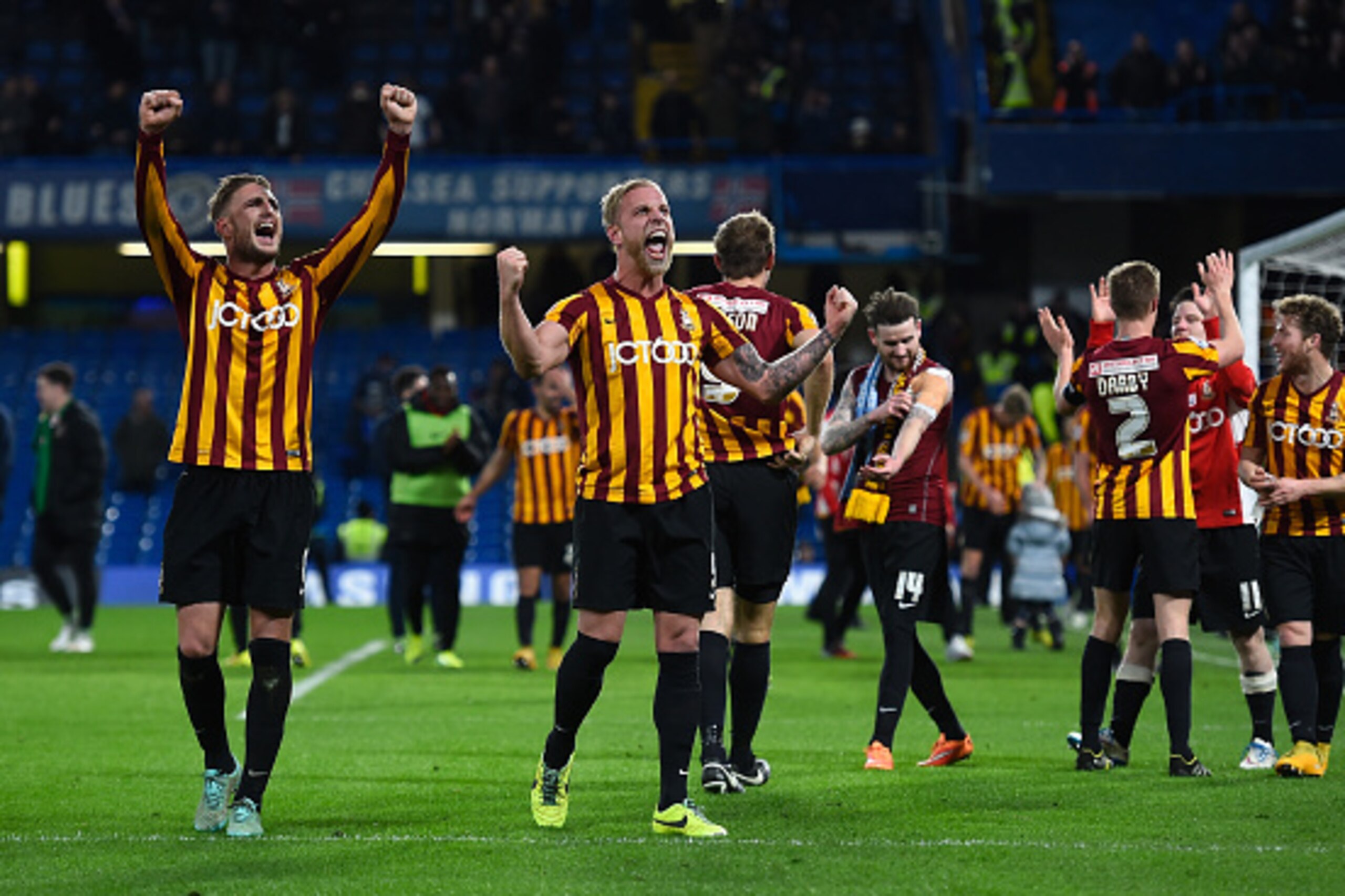 LONDON, ENGLAND - JANUARY 24:  Garry Liddle and Andrew Davies of Bradford celebrate at the end of the FA Cup Fourth Round match between Chelsea and Bradford City at Stamford Bridge on January 24, 2015 in London, England.  (Photo by Mike Hewitt/Getty Image