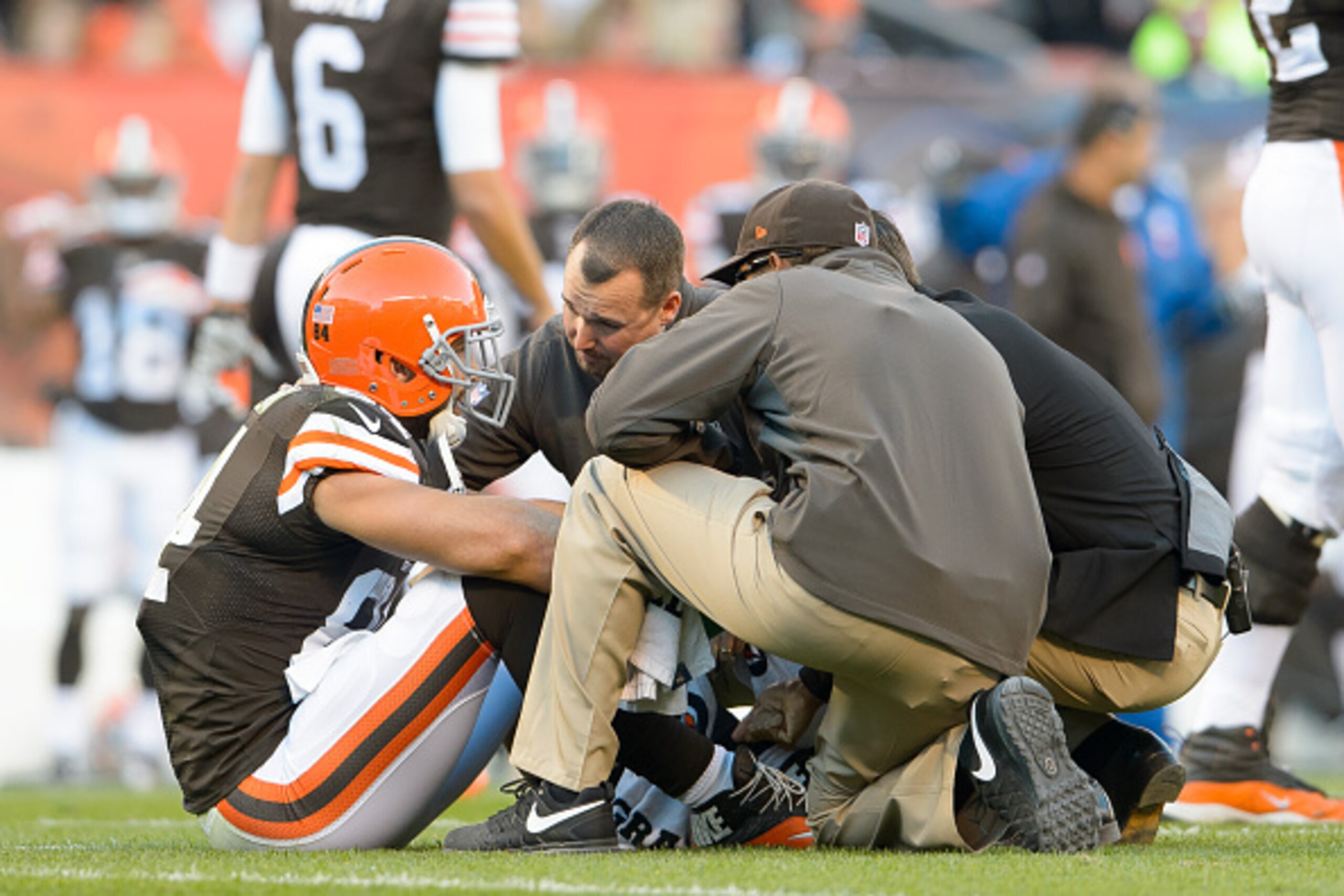 CLEVELAND, OH - OCTOBER 26: Tight end Jordan Cameron #84 of the Cleveland Browns sits on the field after taking a hard hit during the first half against the Oakland Raiders at FirstEnergy Stadium in Cleveland, Ohio. Cameron left the game after the play. (