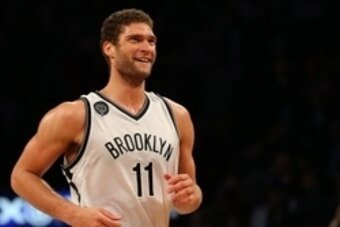 Dec 3, 2014; Brooklyn, NY, USA; Brooklyn Nets center Brook Lopez (11) reacts after making a shot late in the fourth quarter against the San Antonio Spurs at the Barclays Center. The Nets defeated the Spurs 95-93. Mandatory Credit: Adam Hunger-USA TODAY Sp