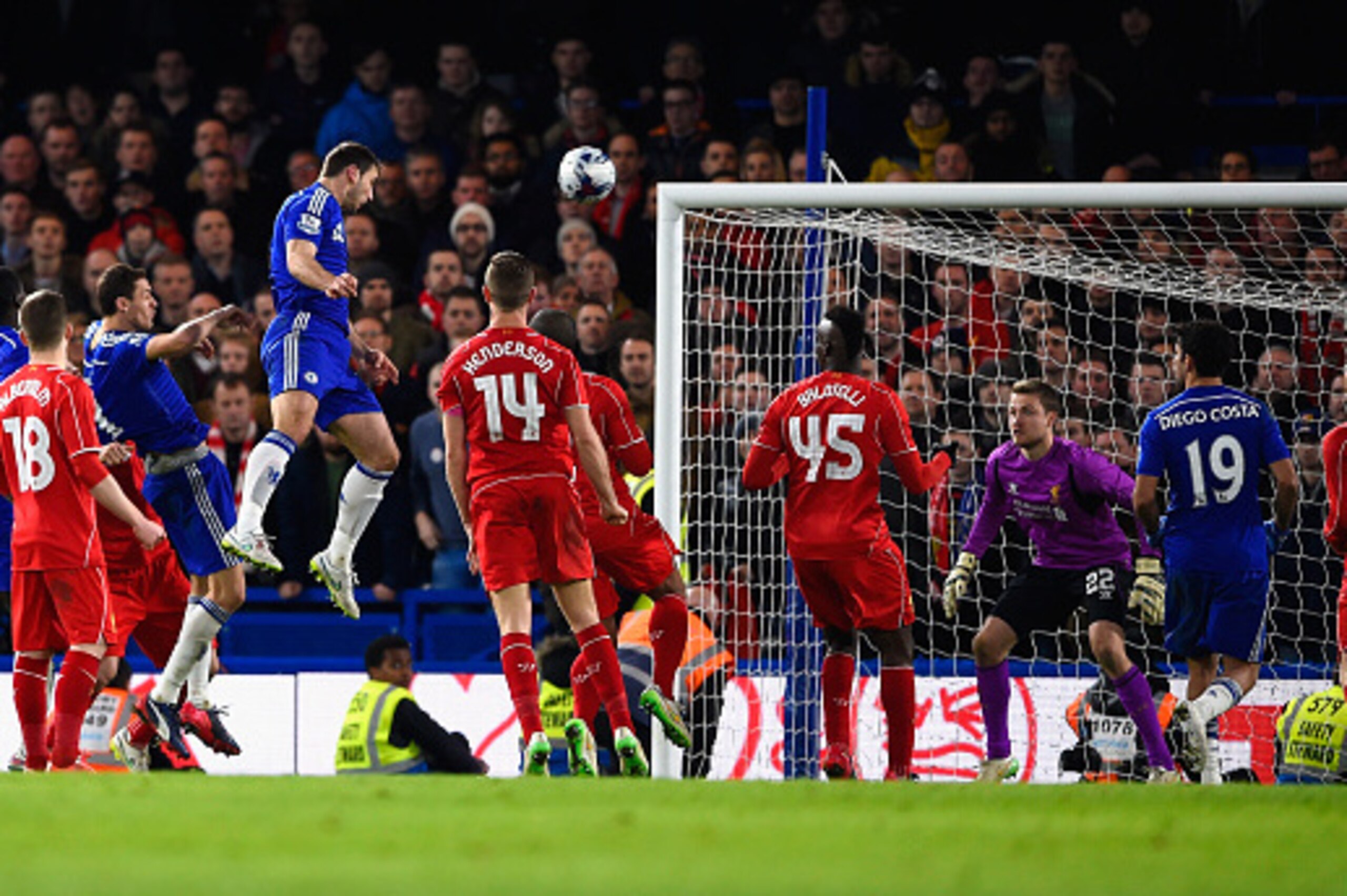 LONDON, ENGLAND - JANUARY 27:  Branislav Ivanovic of Chelsea heads in their first goal in extra time during the Capital One Cup Semi-Final second leg between Chelsea and Liverpool at Stamford Bridge on January 27, 2015 in London, England.  (Photo by Mike 