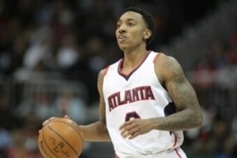 Jan 25, 2015; Atlanta, GA, USA; Atlanta Hawks guard Jeff Teague (0) dribbles the ball against the Minnesota Timberwolves in the fourth quarter at Philips Arena. The Hawks defeated the Timberwolves 112-100. Mandatory Credit: Brett Davis-USA TODAY Sports