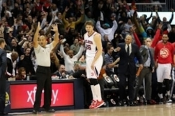 Jan 7, 2015; Atlanta, GA, USA; Atlanta Hawks guard Kyle Korver (26) celebrates making a three-point basket against the Memphis Grizzlies during 4th quarter at Philips Arena. The Hawks won 96-86. Mandatory Credit: Kevin Liles-USA TODAY Sports