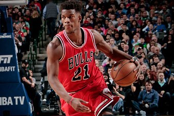 DALLAS, TX - JANUARY 23: Jimmy Butler #21 of the Chicago Bulls handles the ball against the Dallas Mavericks on January 23, 2015 at the American Airlines Center in Dallas, Texas. NOTE TO USER: User expressly acknowledges and agrees that, by downloading an