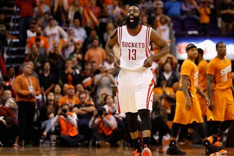 PHOENIX, AZ - JANUARY 23:  James Harden #13 of the Houston Rockets reacts after making the game winning shot to defeat the Phoenix Suns during the final seconds of the NBA game at US Airways Center on January 23, 2015 in Phoenix, Arizona.  The Rockets def