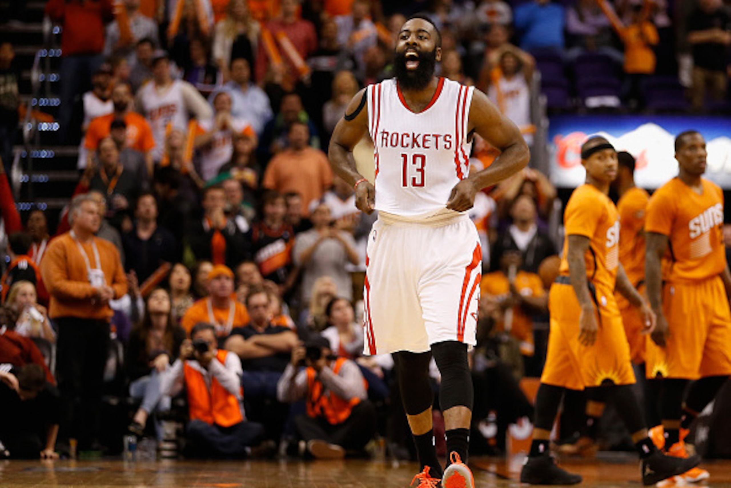 PHOENIX, AZ - JANUARY 23:  James Harden #13 of the Houston Rockets reacts after making the game winning shot to defeat the Phoenix Suns during the final seconds of the NBA game at US Airways Center on January 23, 2015 in Phoenix, Arizona.  The Rockets def