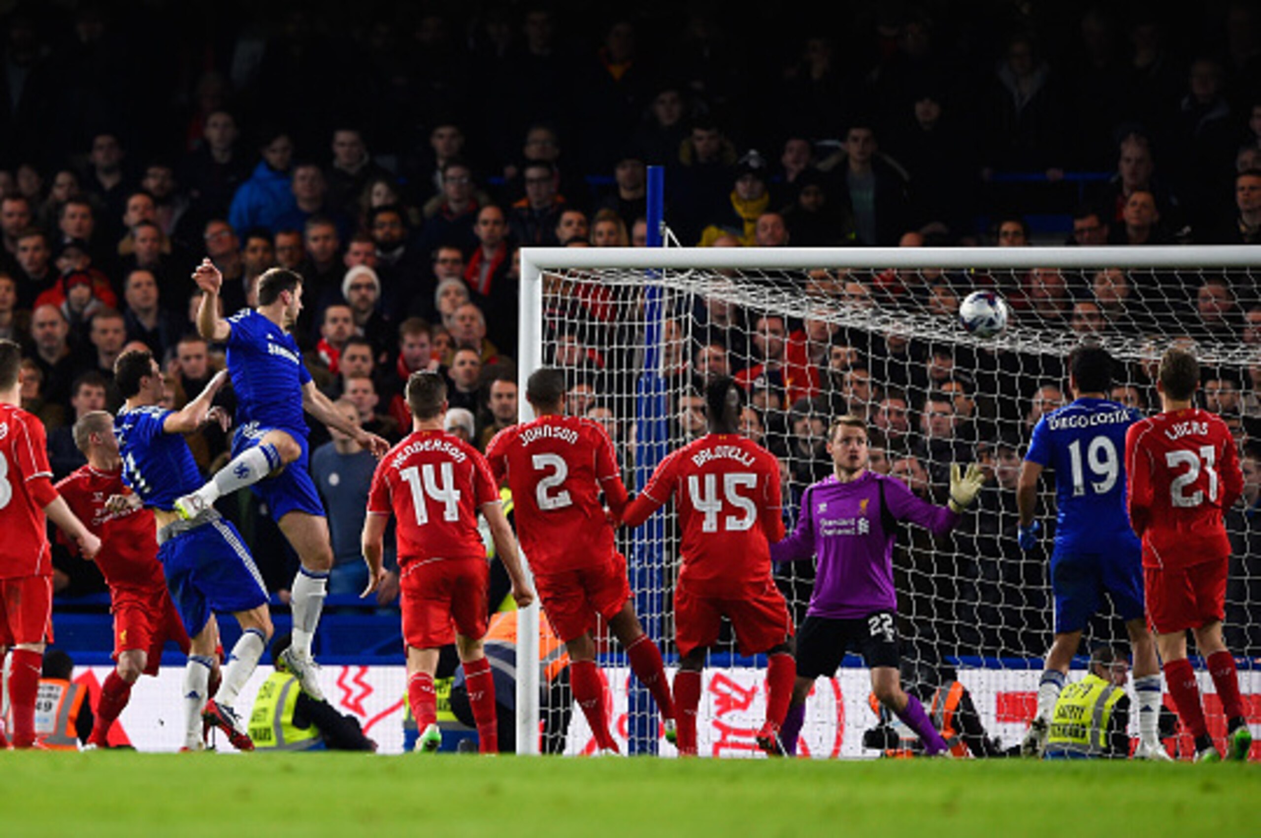 LONDON, ENGLAND - JANUARY 27:  Branislav Ivanovic of Chelsea heads in their first goal in extra time during the Capital One Cup Semi-Final second leg between Chelsea and Liverpool at Stamford Bridge on January 27, 2015 in London, England.  (Photo by Mike 