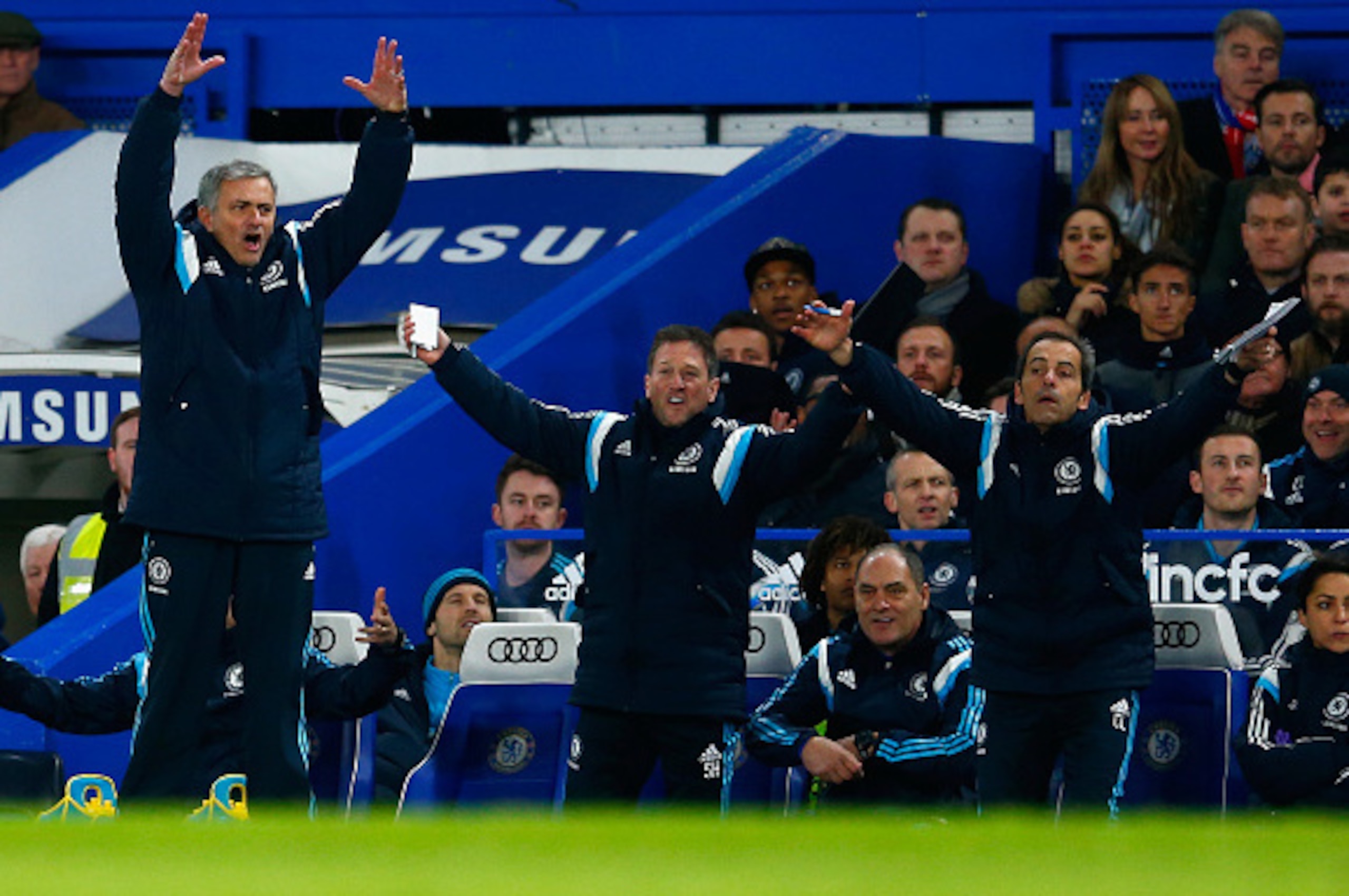 LONDON, ENGLAND - JANUARY 27:  Jose Mourinho manager of Chelsea and assistant Steve Holland (C) react during the Capital One Cup Semi-Final second leg between Chelsea and Liverpool at Stamford Bridge on January 27, 2015 in London, England.  (Photo by Juli